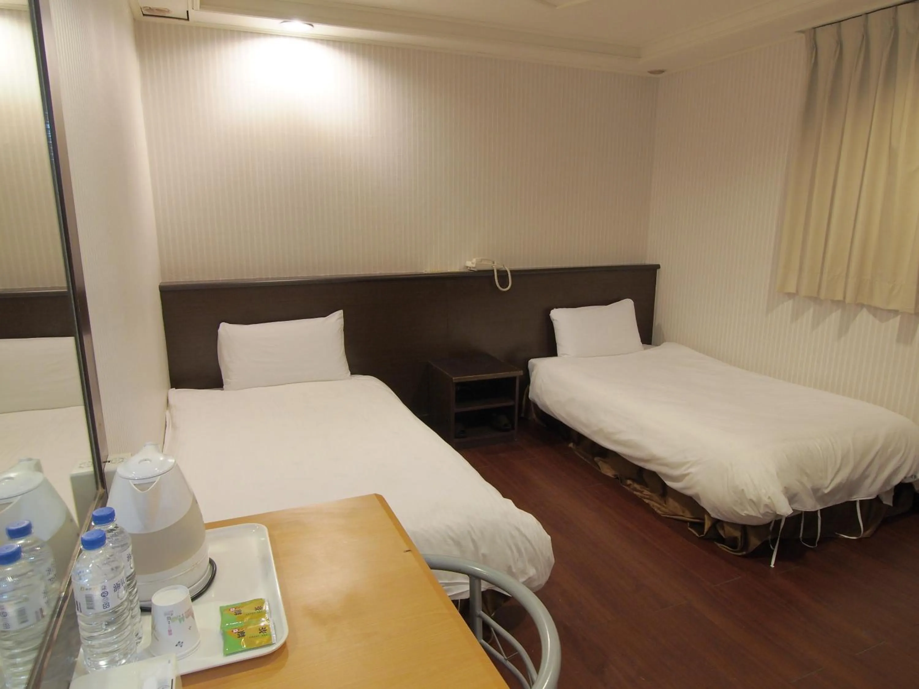 Bed in Yi Pin Yuan Hotel