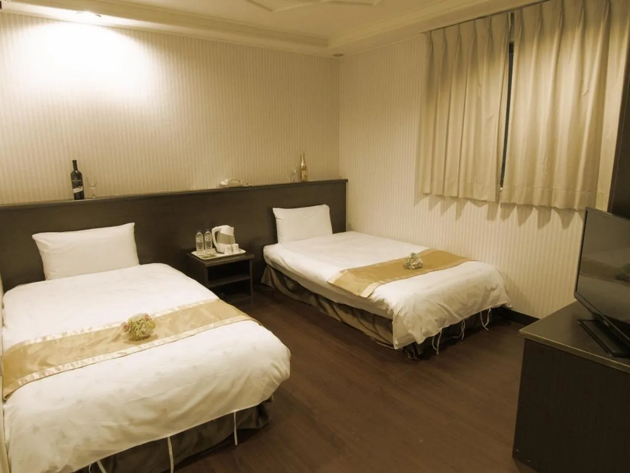 Bed in Yi Pin Yuan Hotel