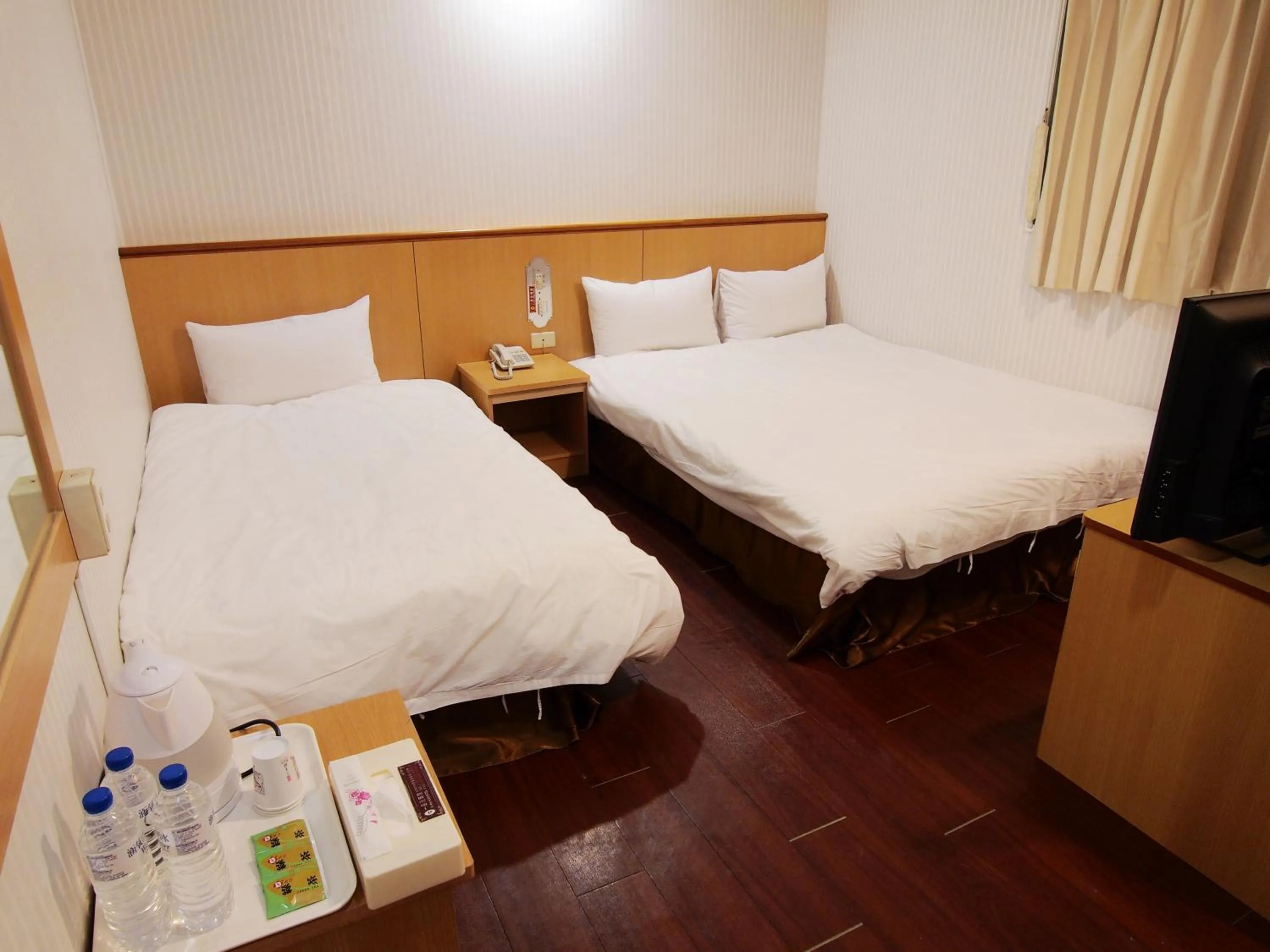 Bed in Yi Pin Yuan Hotel