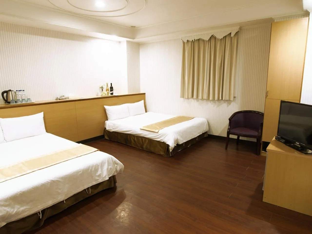 Bed in Yi Pin Yuan Hotel