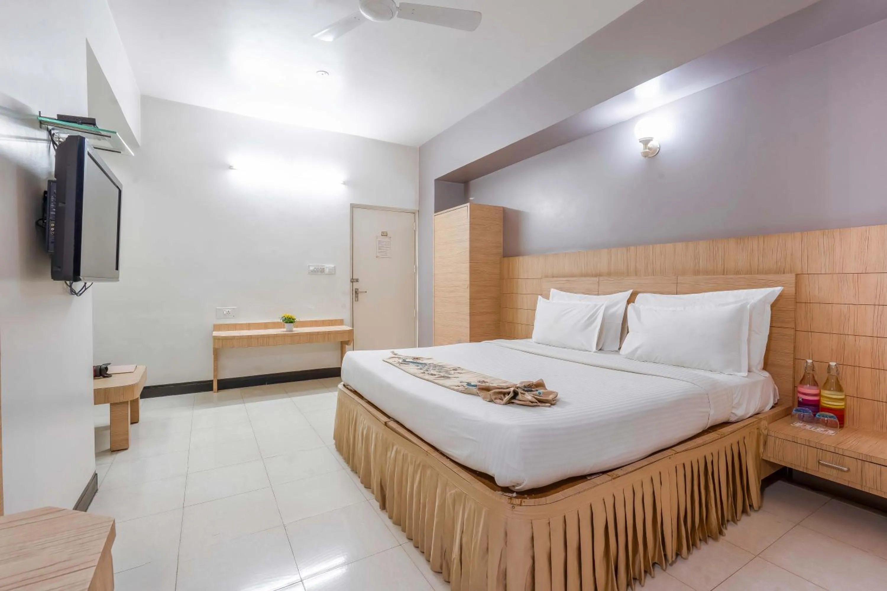 Bed in Hotel Ashish Palace