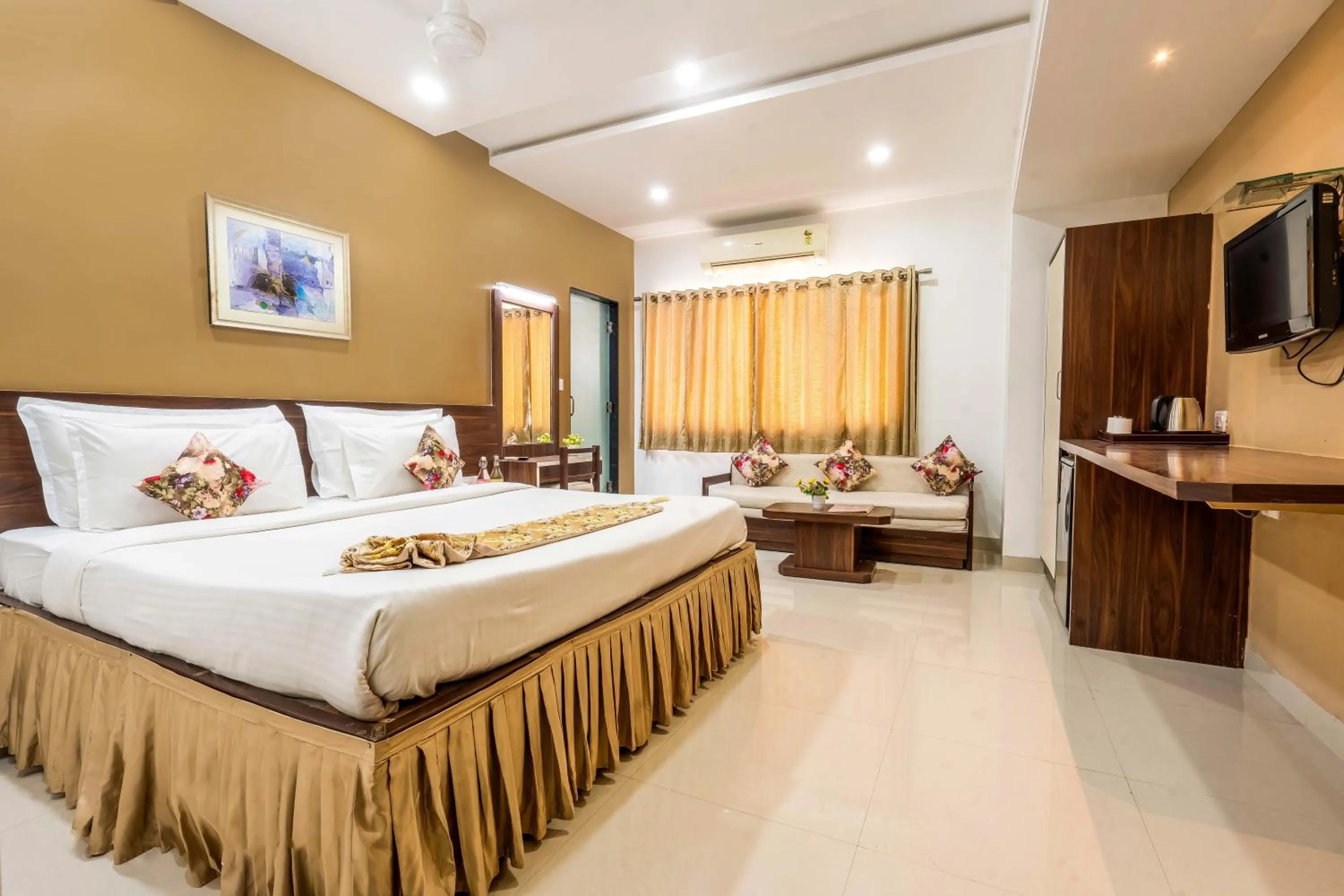 Bed in Hotel Ashish Palace