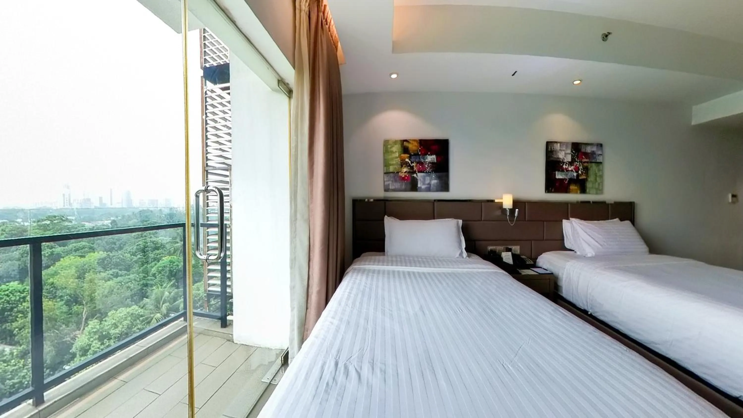 Bed in Hotel The Grandmark-Dhaka