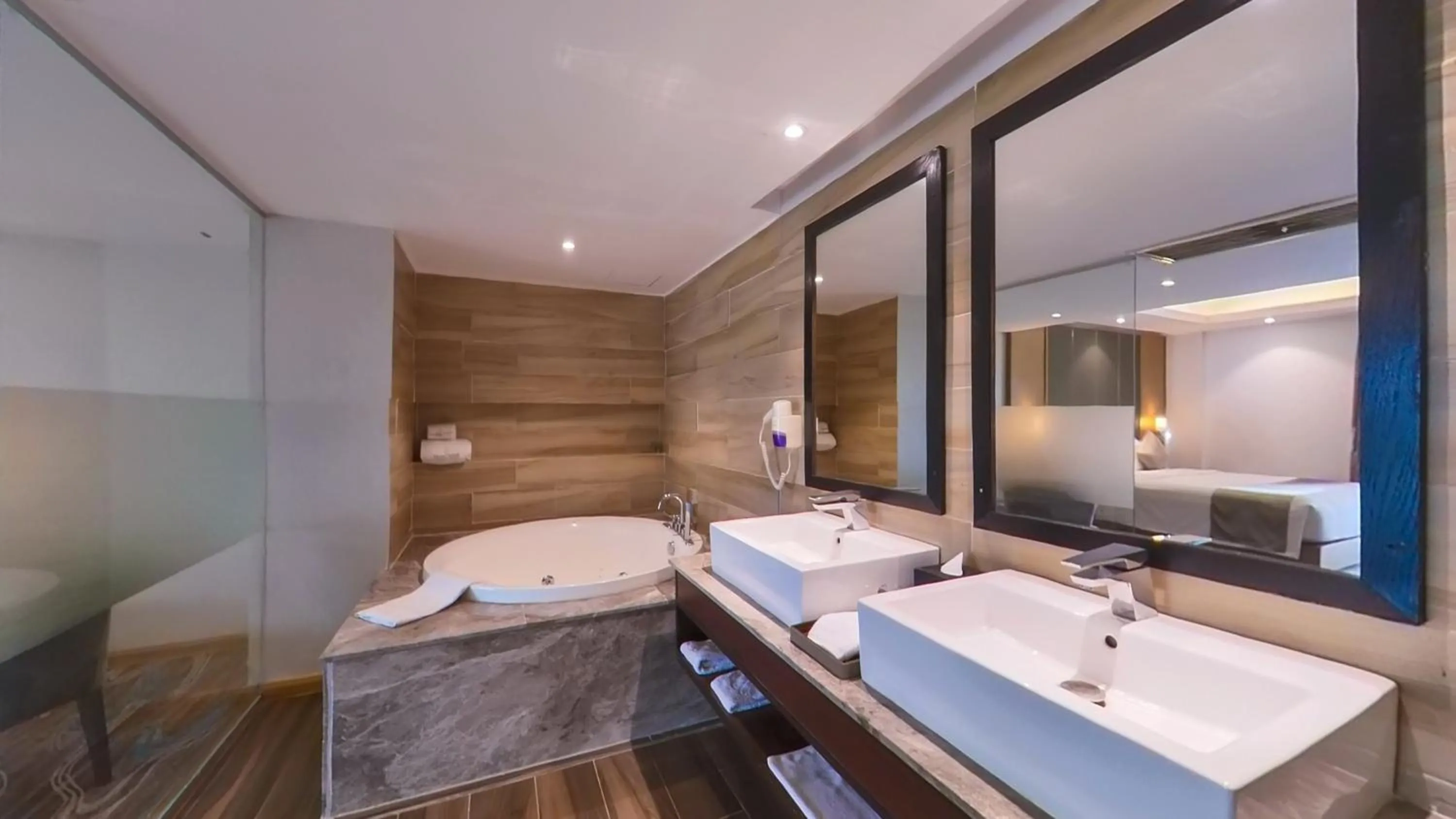 Bathroom, Bed in Hotel The Grandmark-Dhaka