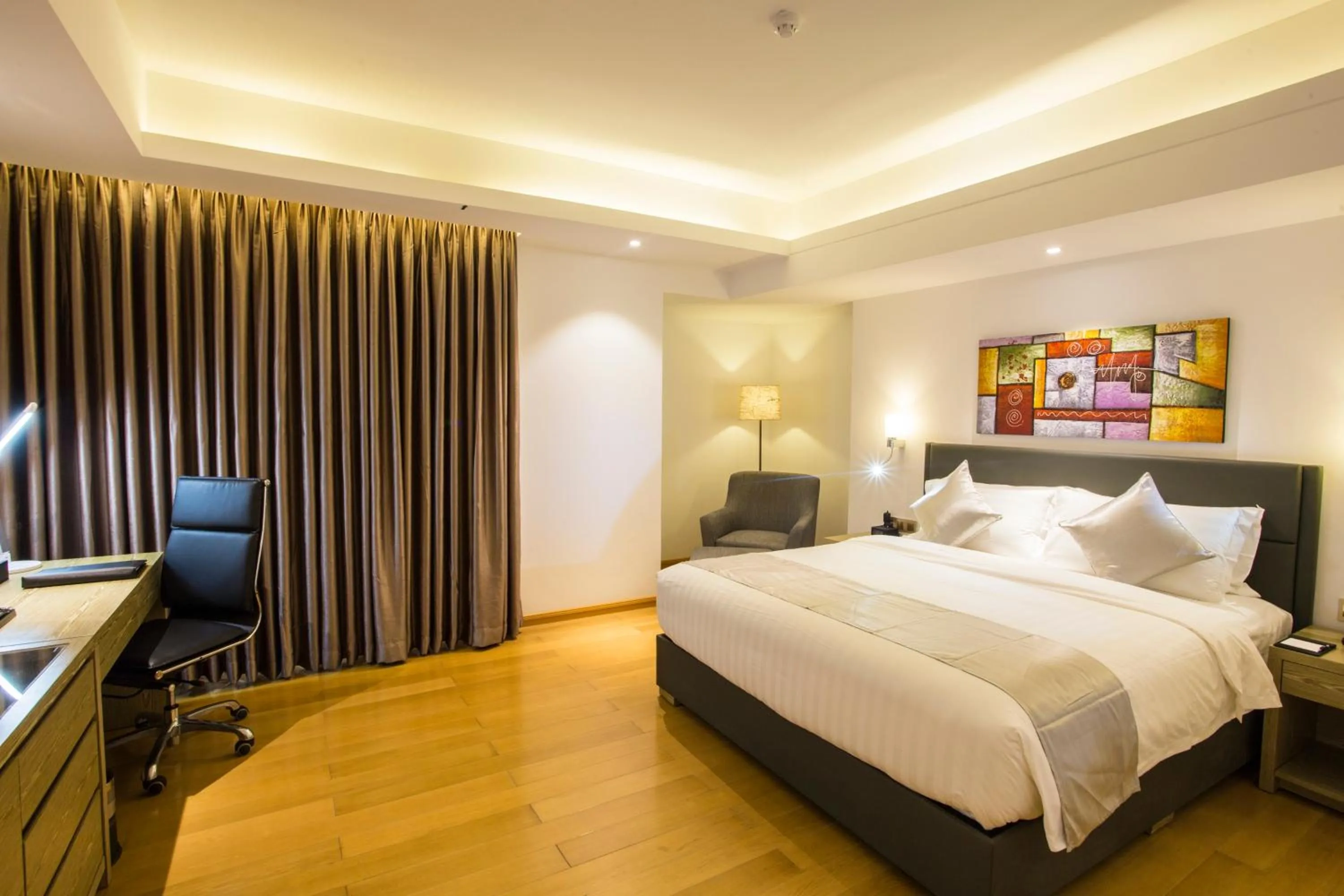 Bed in Hotel The Grandmark-Dhaka