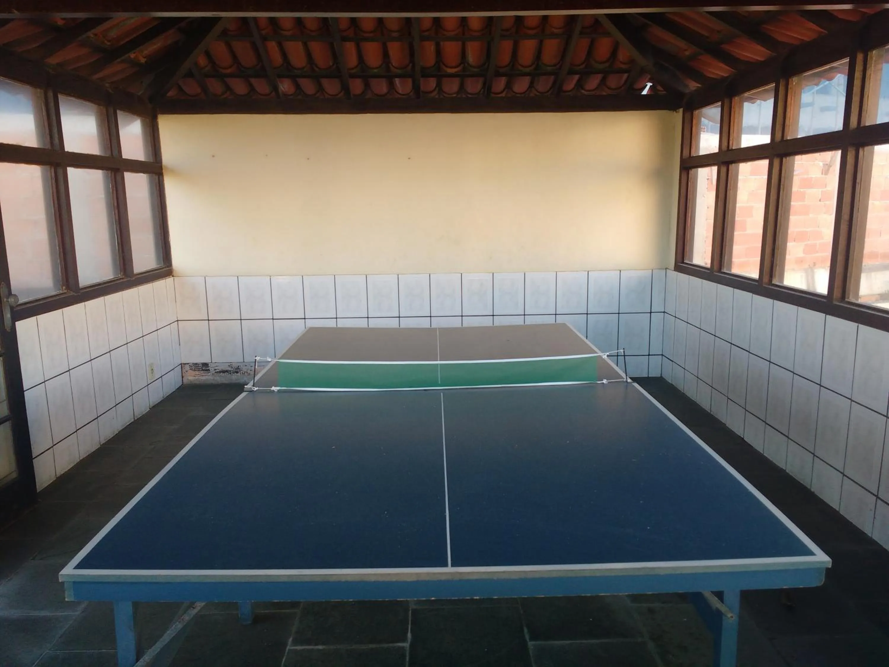 Table tennis in Casa 4 quartos Condomínio em Frente a Praia Grande