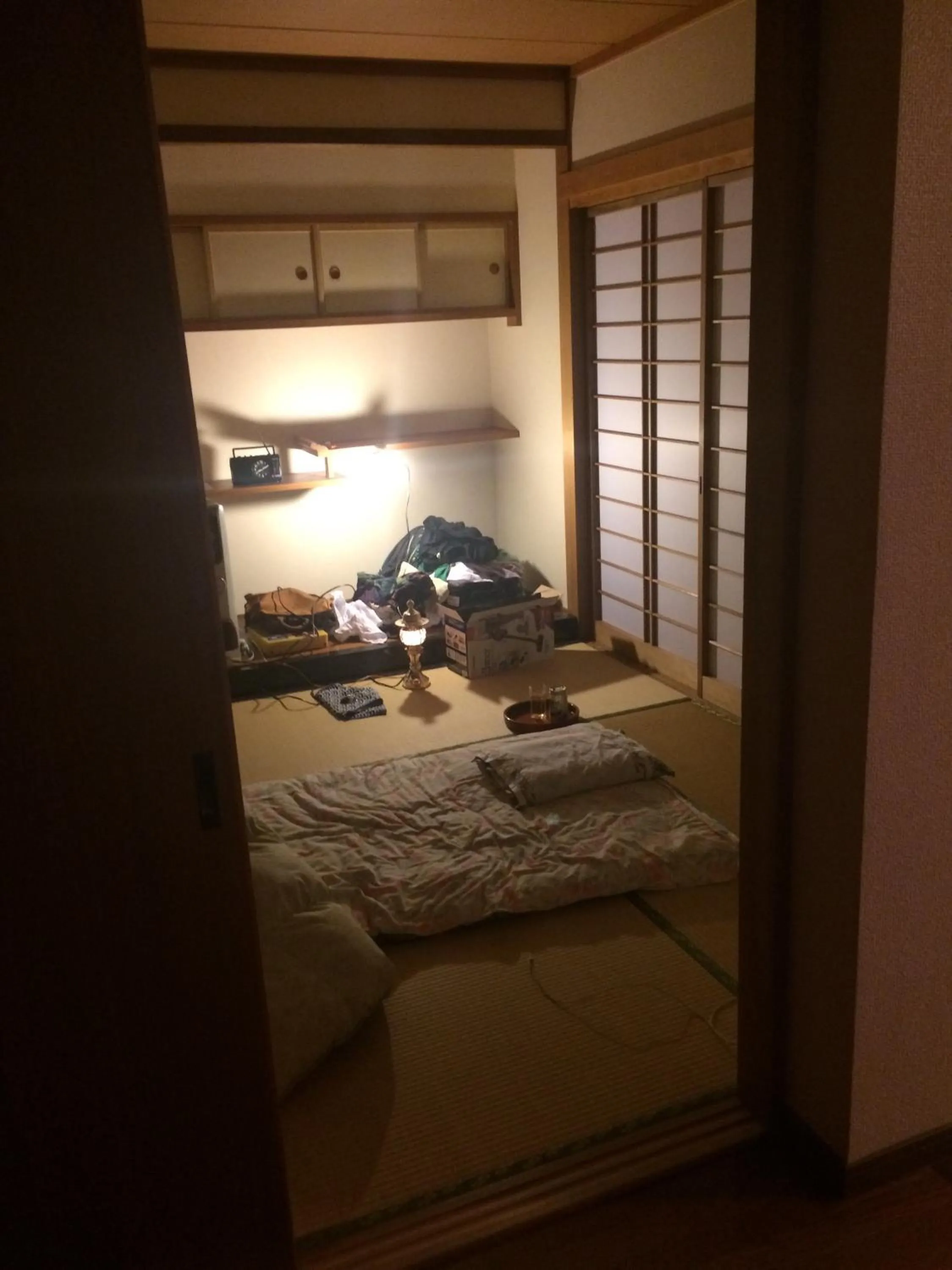 Bed in Wholeearth Ryokan Hiroshima