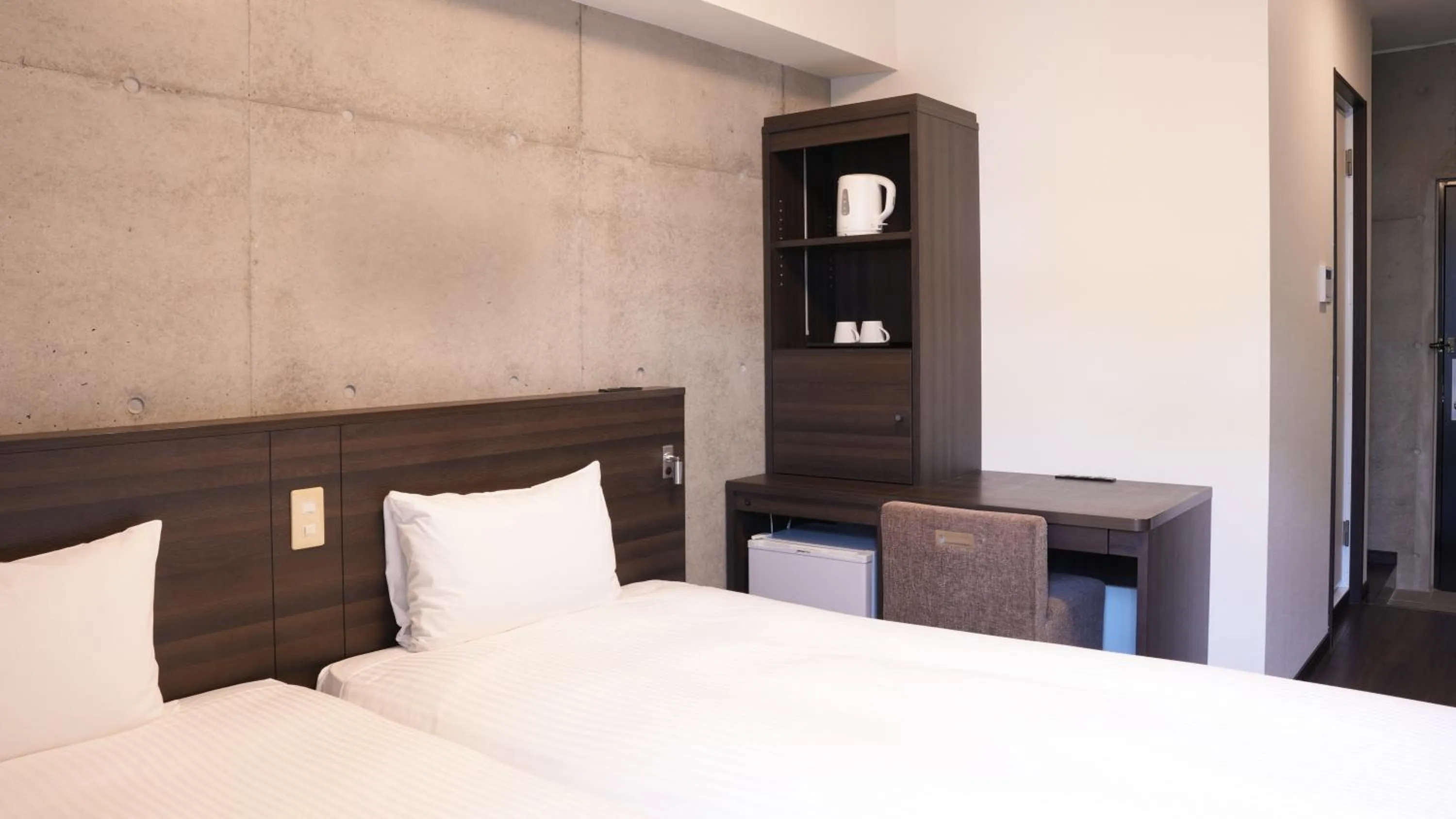 Bed in The BREAKFAST HOTEL PORTO Ishigakijima