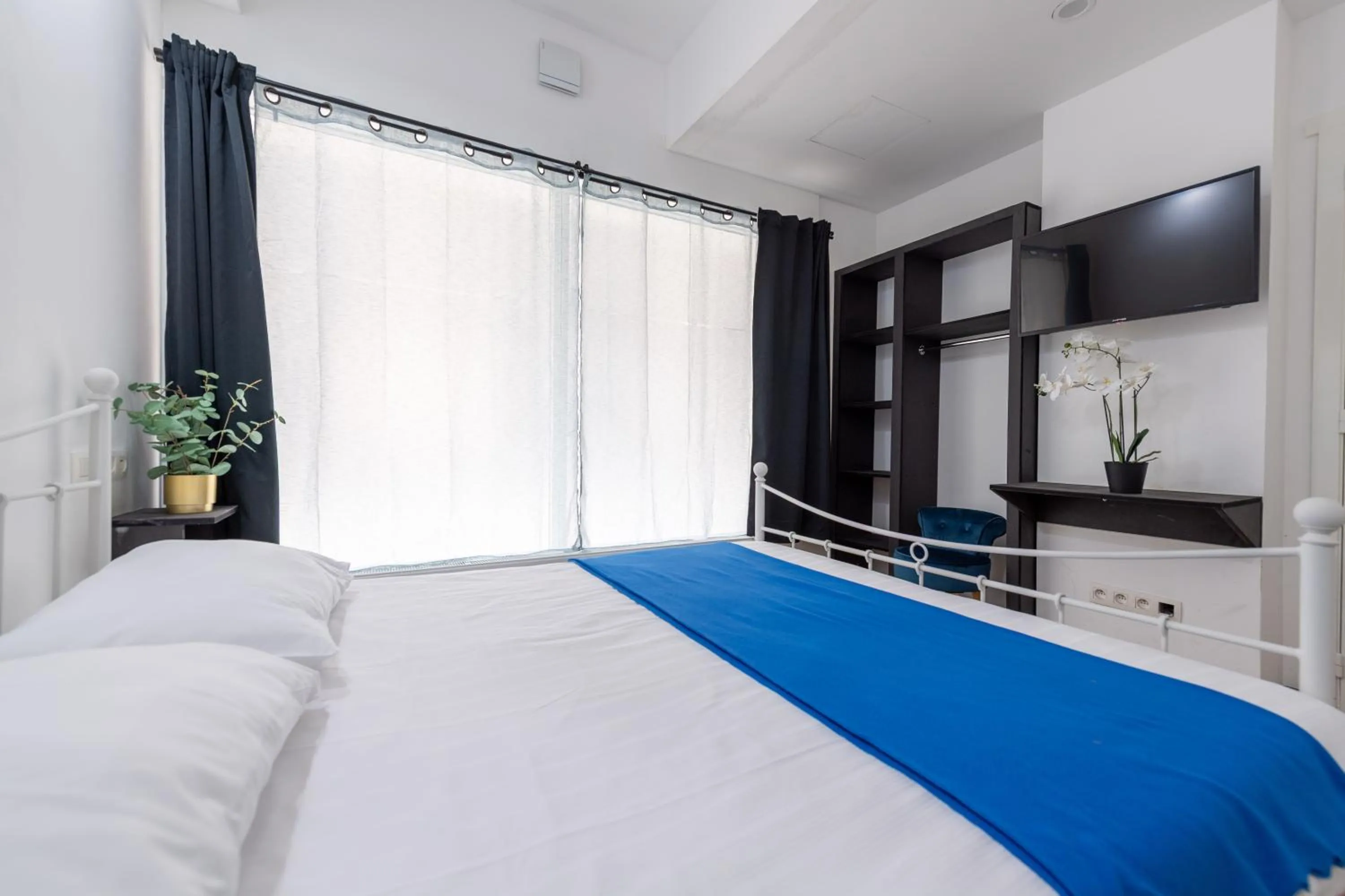 Bed in Hotel Le Grand Colombier