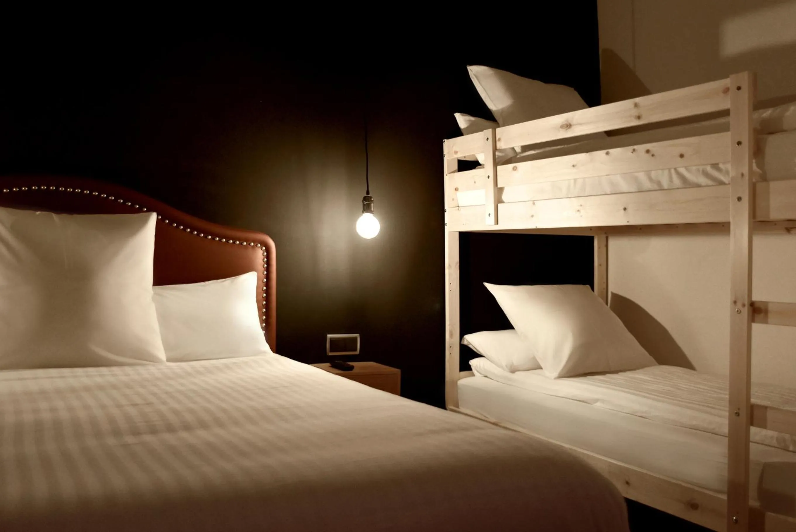 Bed in Woohoo Suites Madrid