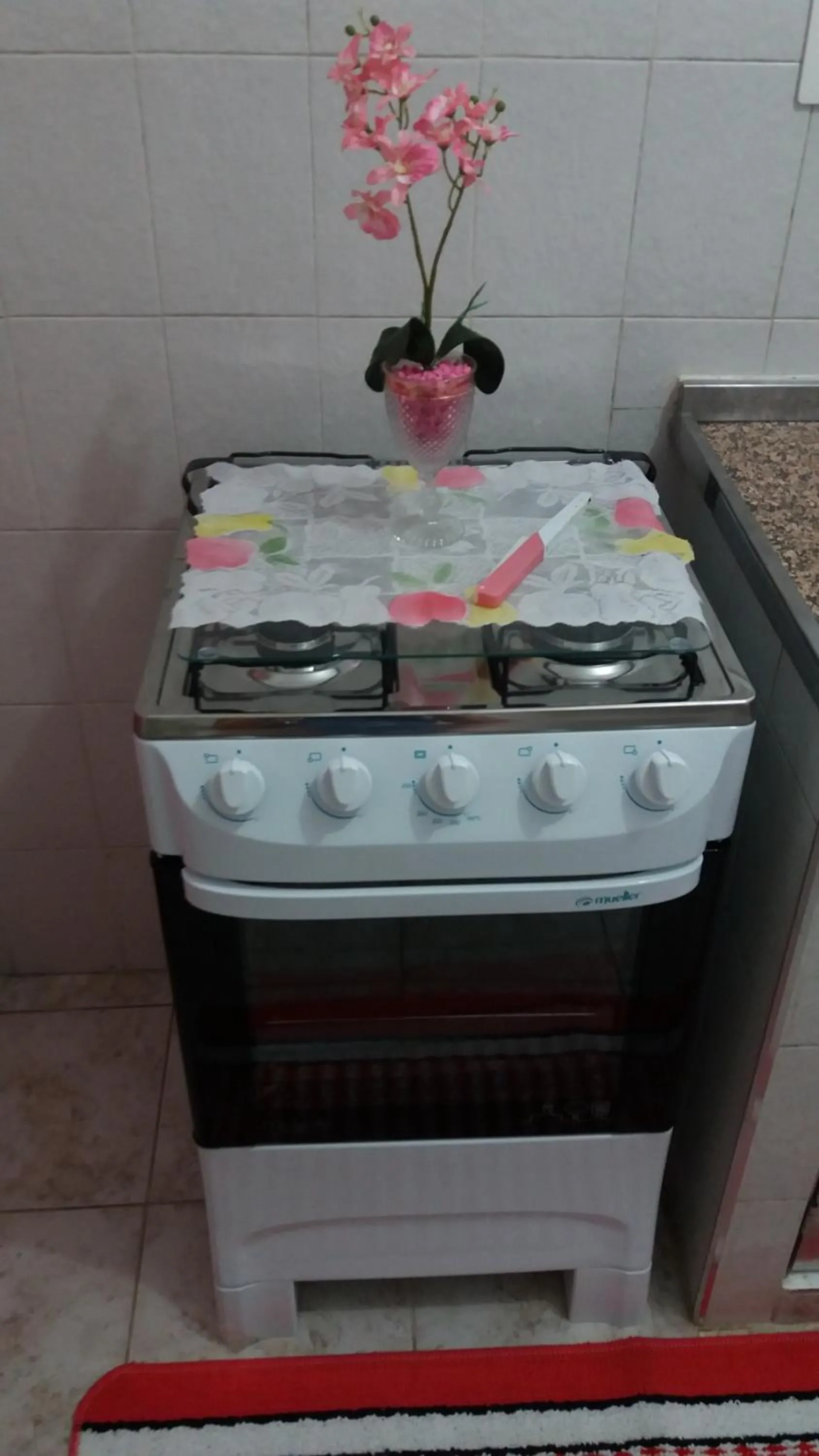 Communal kitchen in Apartamento Aconchego da vovó