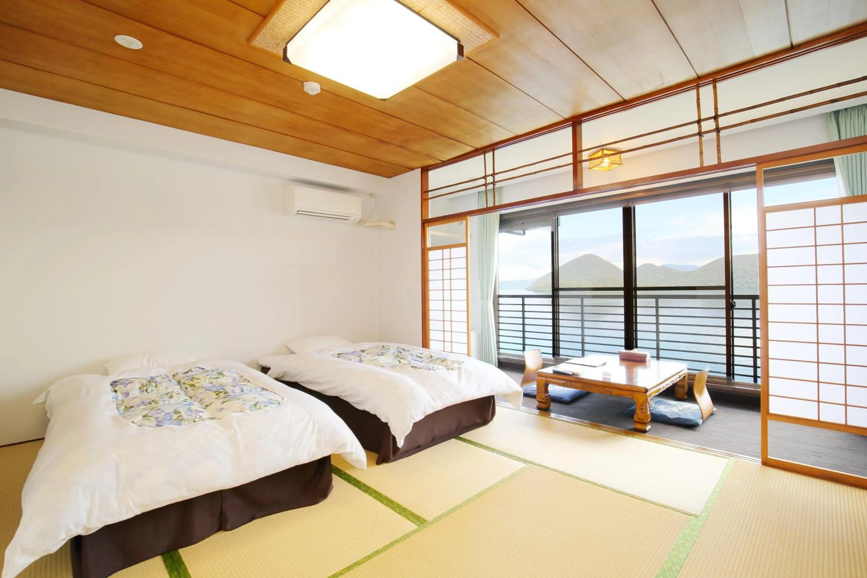 Photo of the whole room, Bed in Toya-onsen Hotel Hanabi