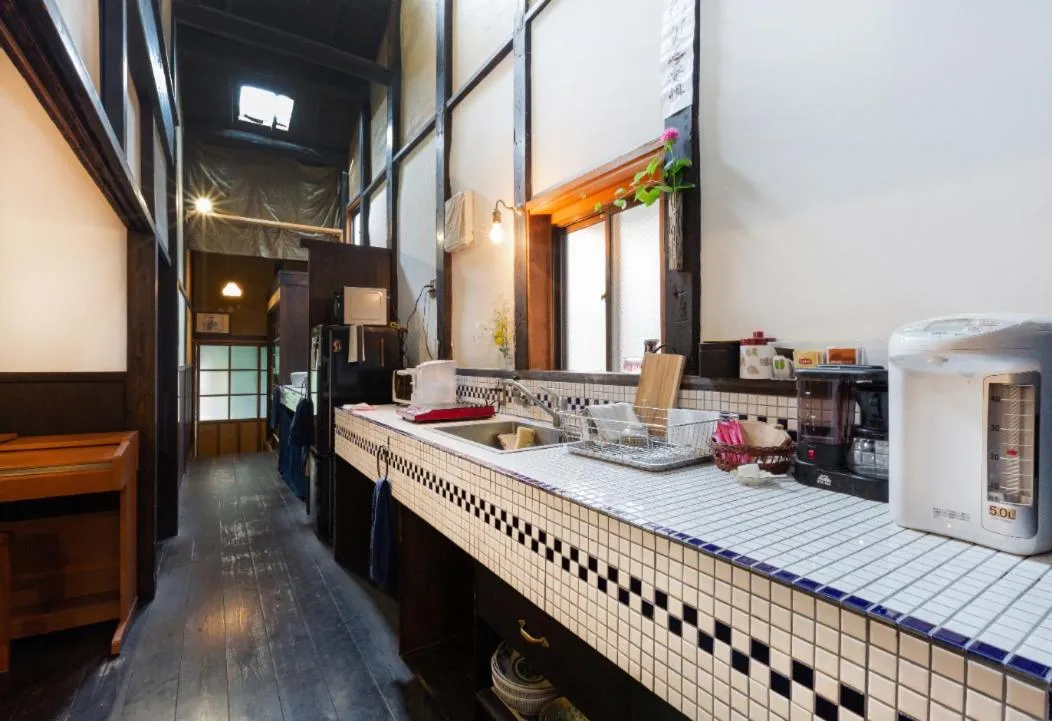Kitchen or kitchenette in お宿梅夜Guesthouse Umeya