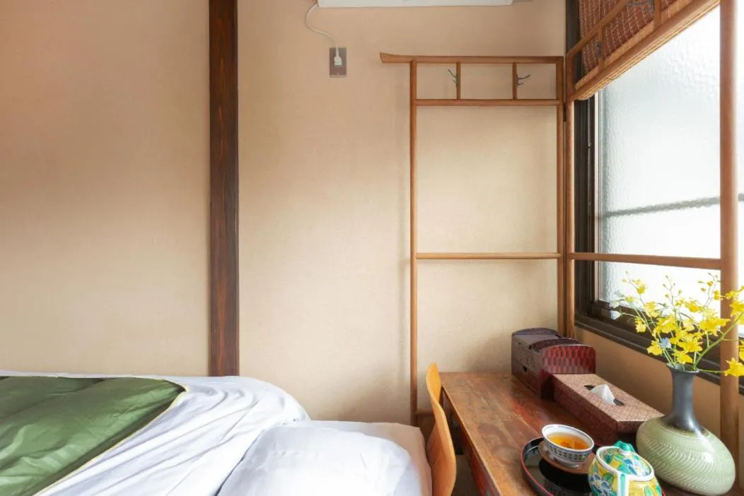 Bed in お宿梅夜Guesthouse Umeya