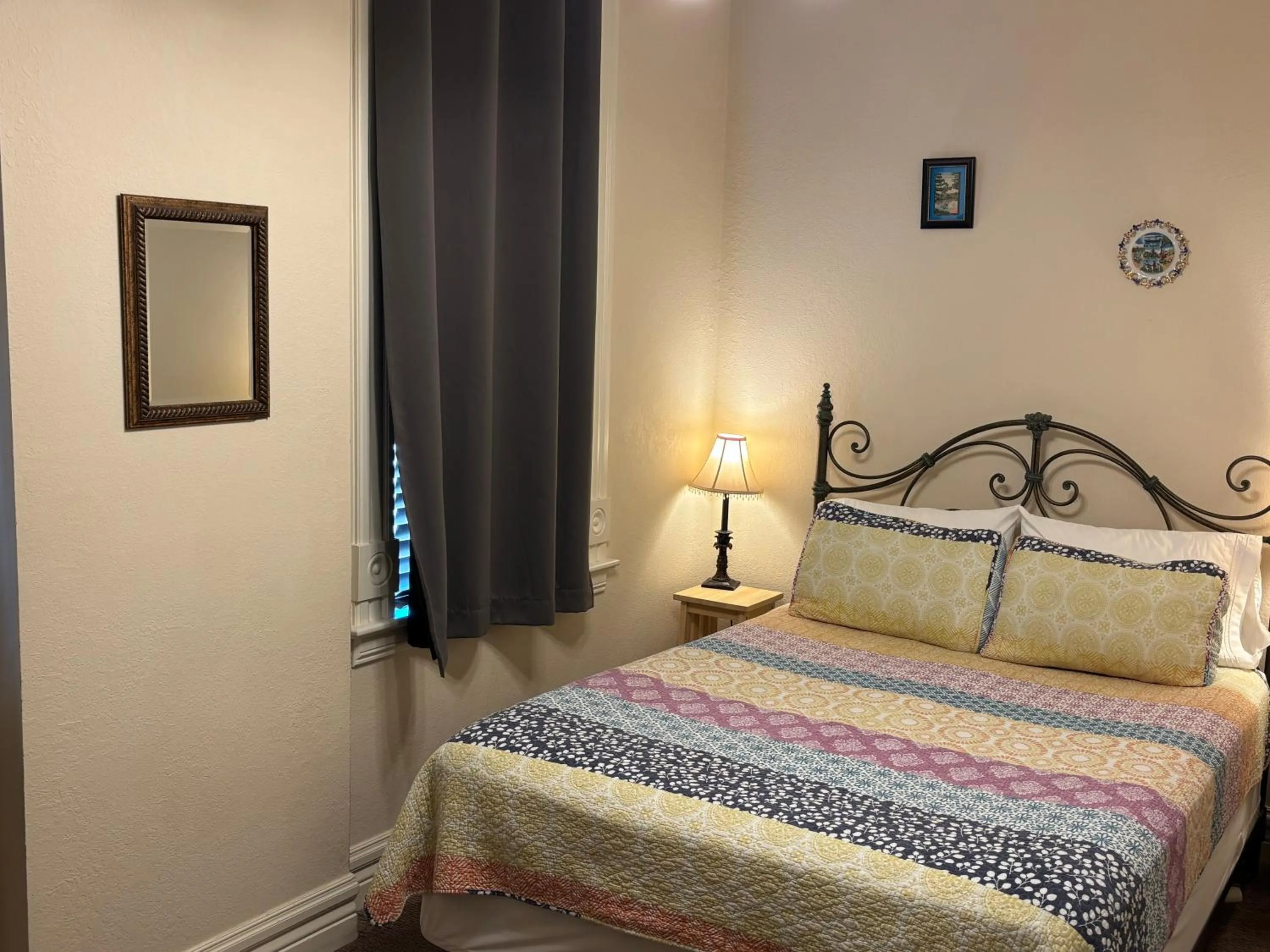 Bed in Hermann Crown Suites