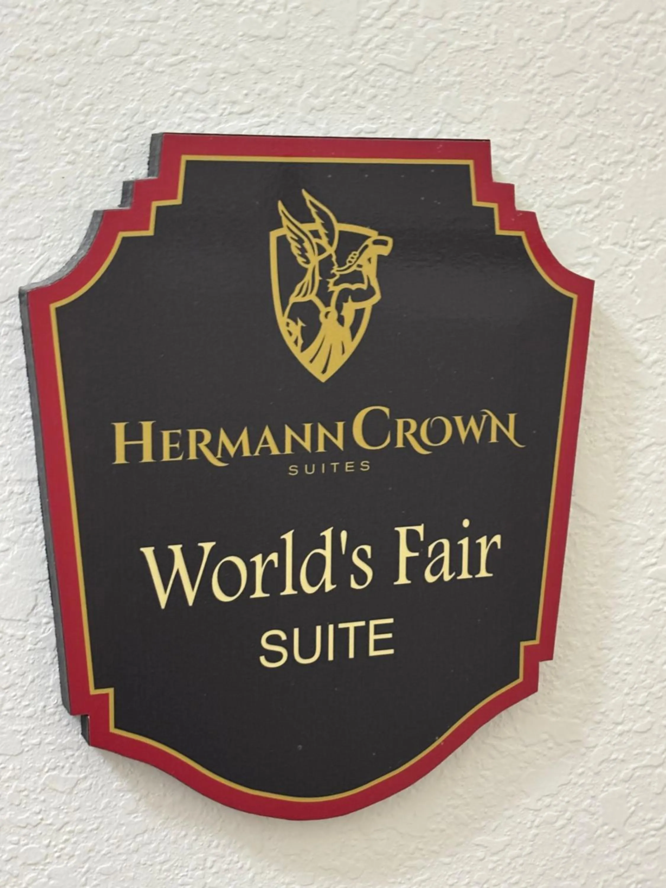 Property logo or sign in Hermann Crown Suites