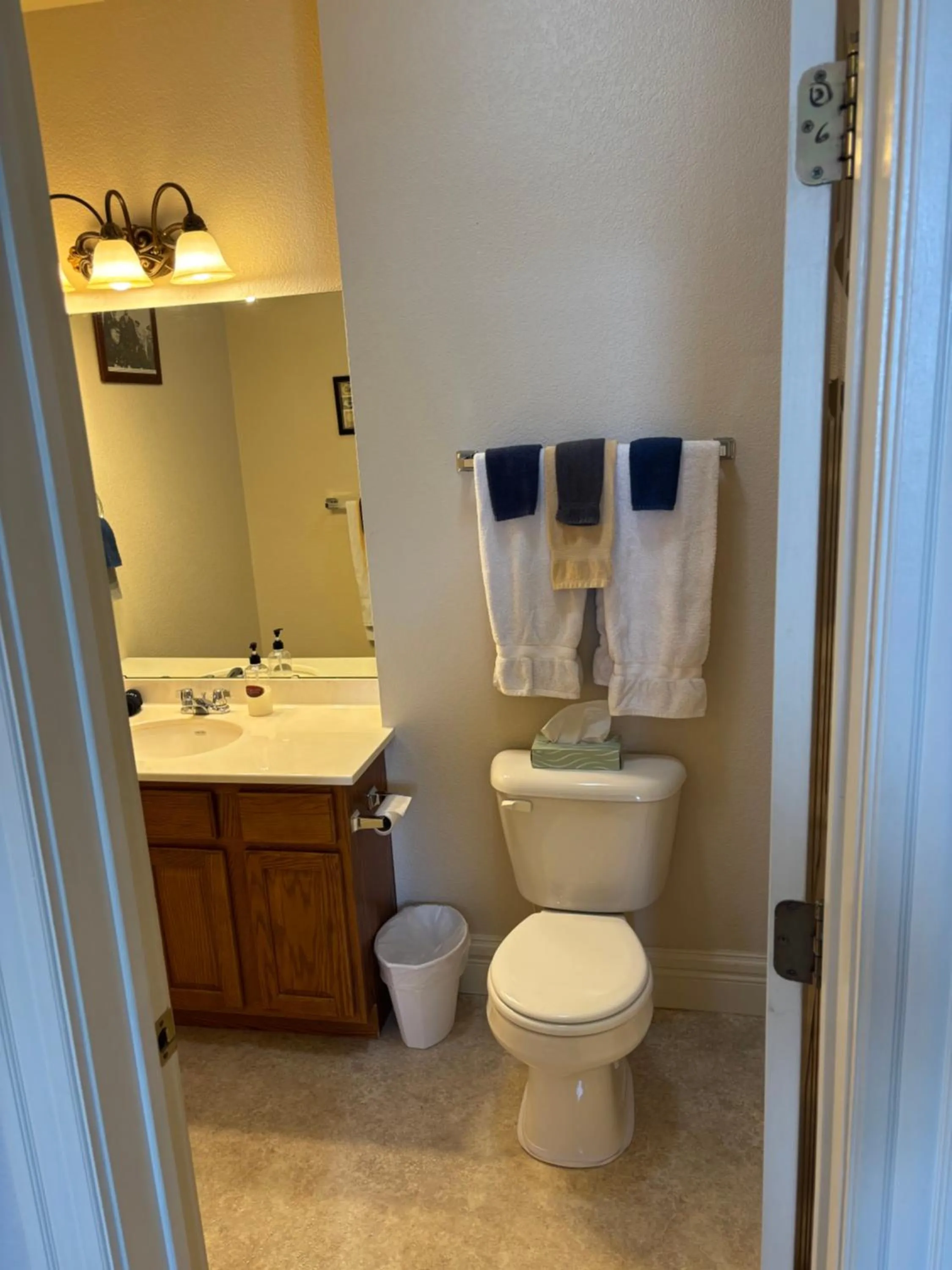 Toilet in Hermann Crown Suites