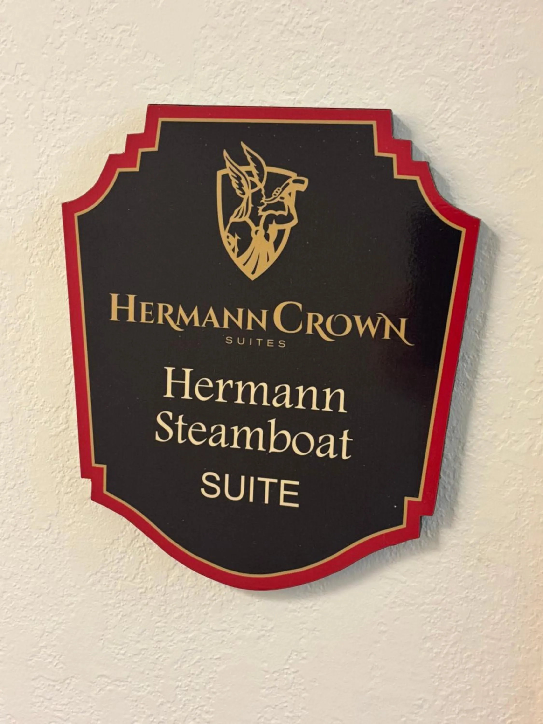 Property logo or sign in Hermann Crown Suites