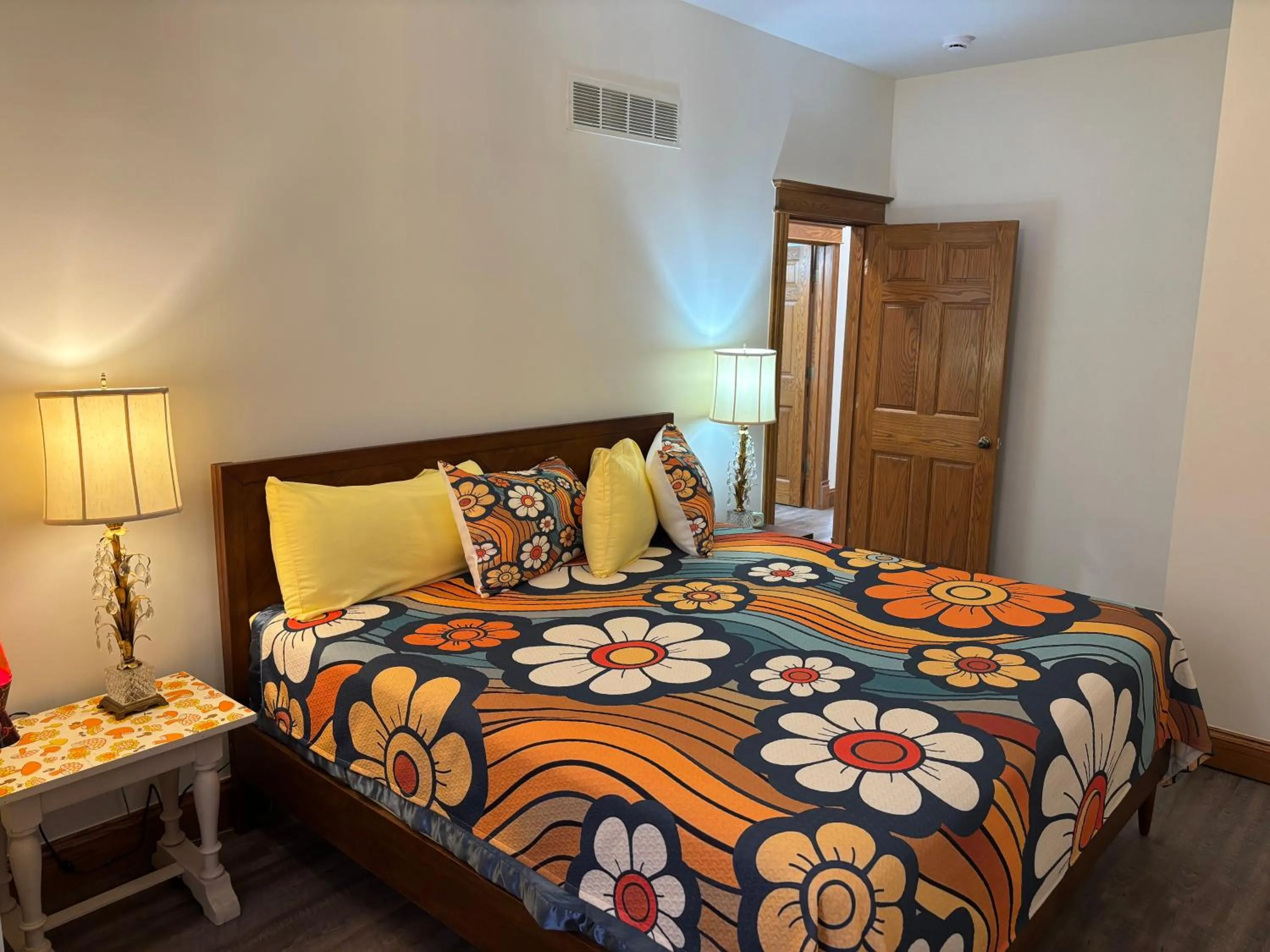 Bed in Hermann Crown Suites