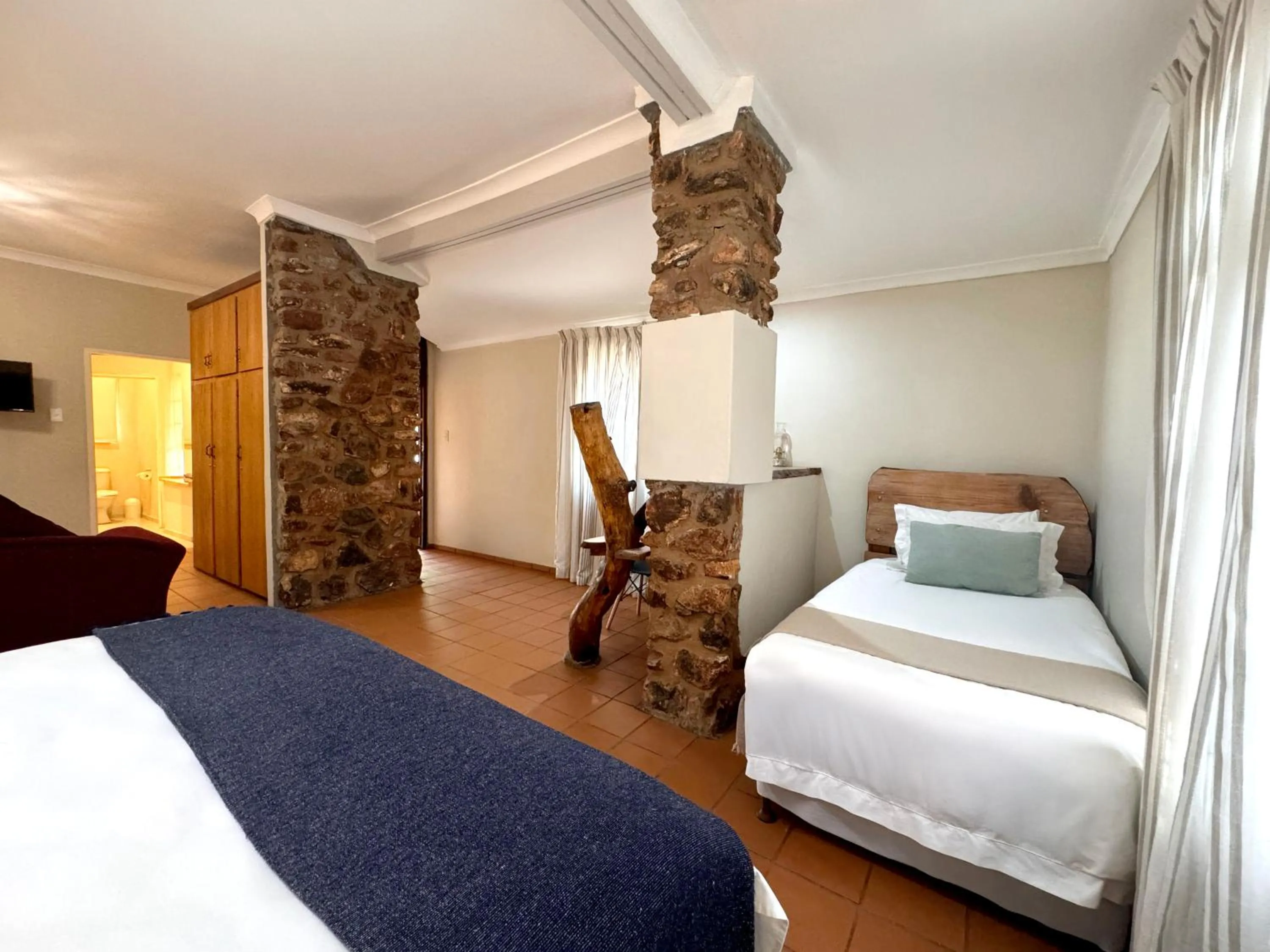 Bed in Centurion Guest House and Lodge