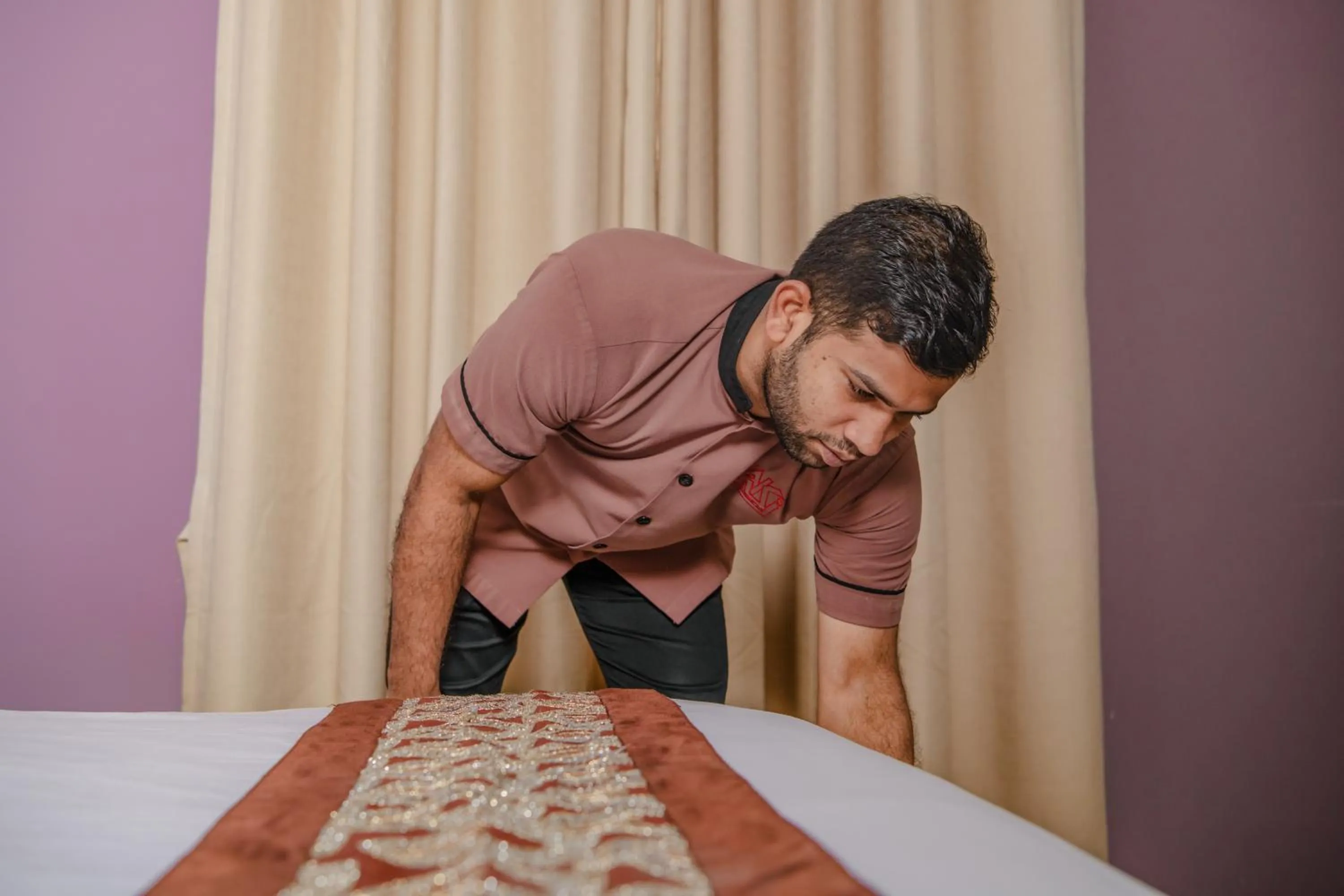 Bed in Zaki Hotel Apartment