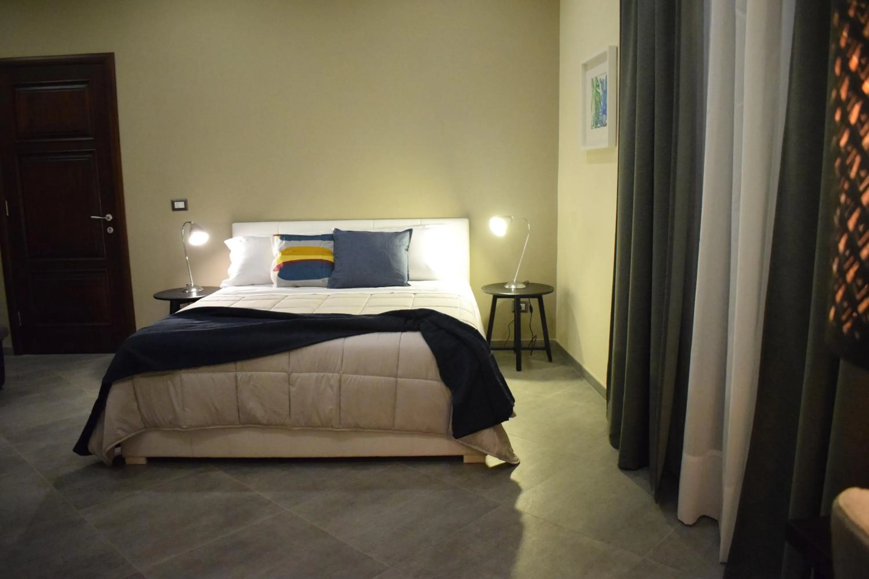 Bed in Cento Tari' Guest House