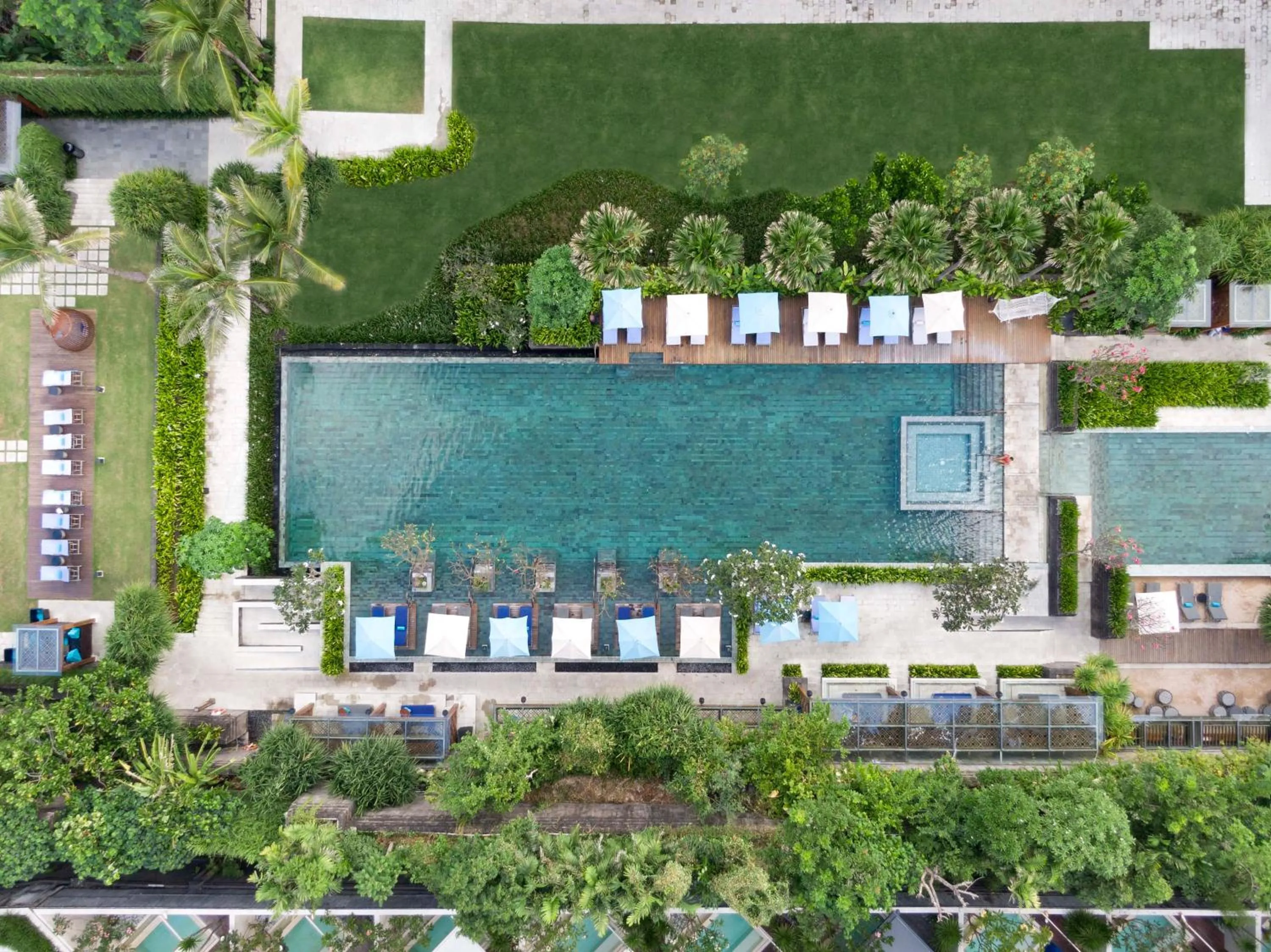 Swimming pool in Hotel Indigo Bali Seminyak Beach by IHG