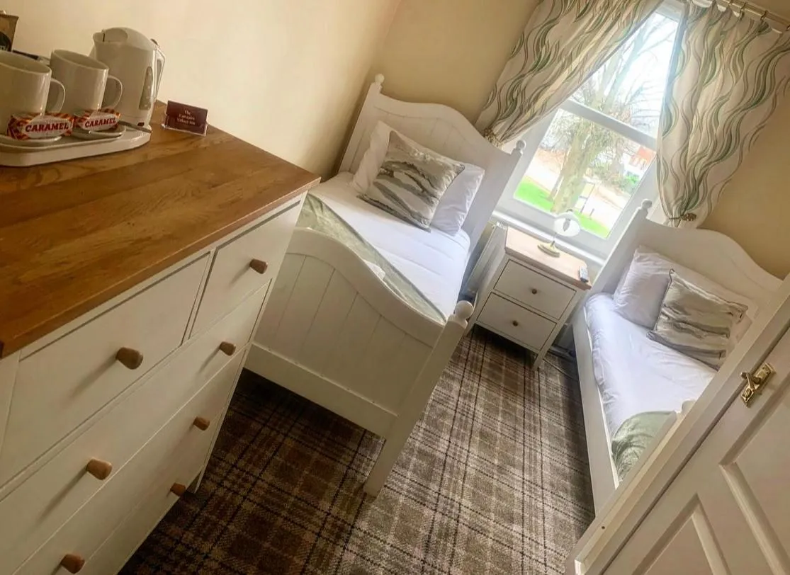 Bed in The Village Inn