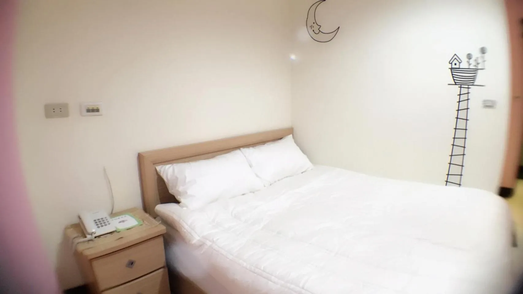 Seating area, Bed in HFun Hotel