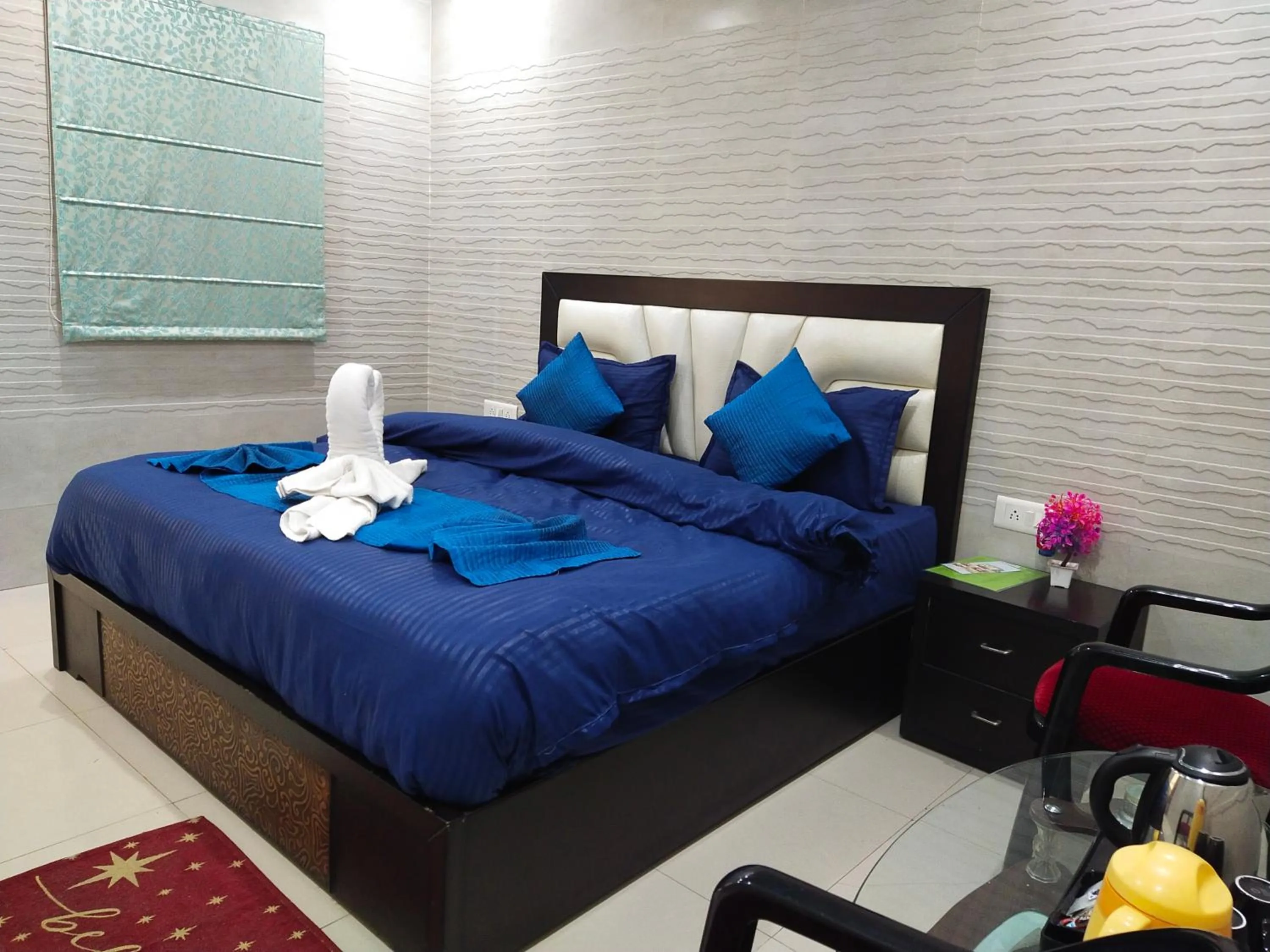 Bed in Hotel Gangotri