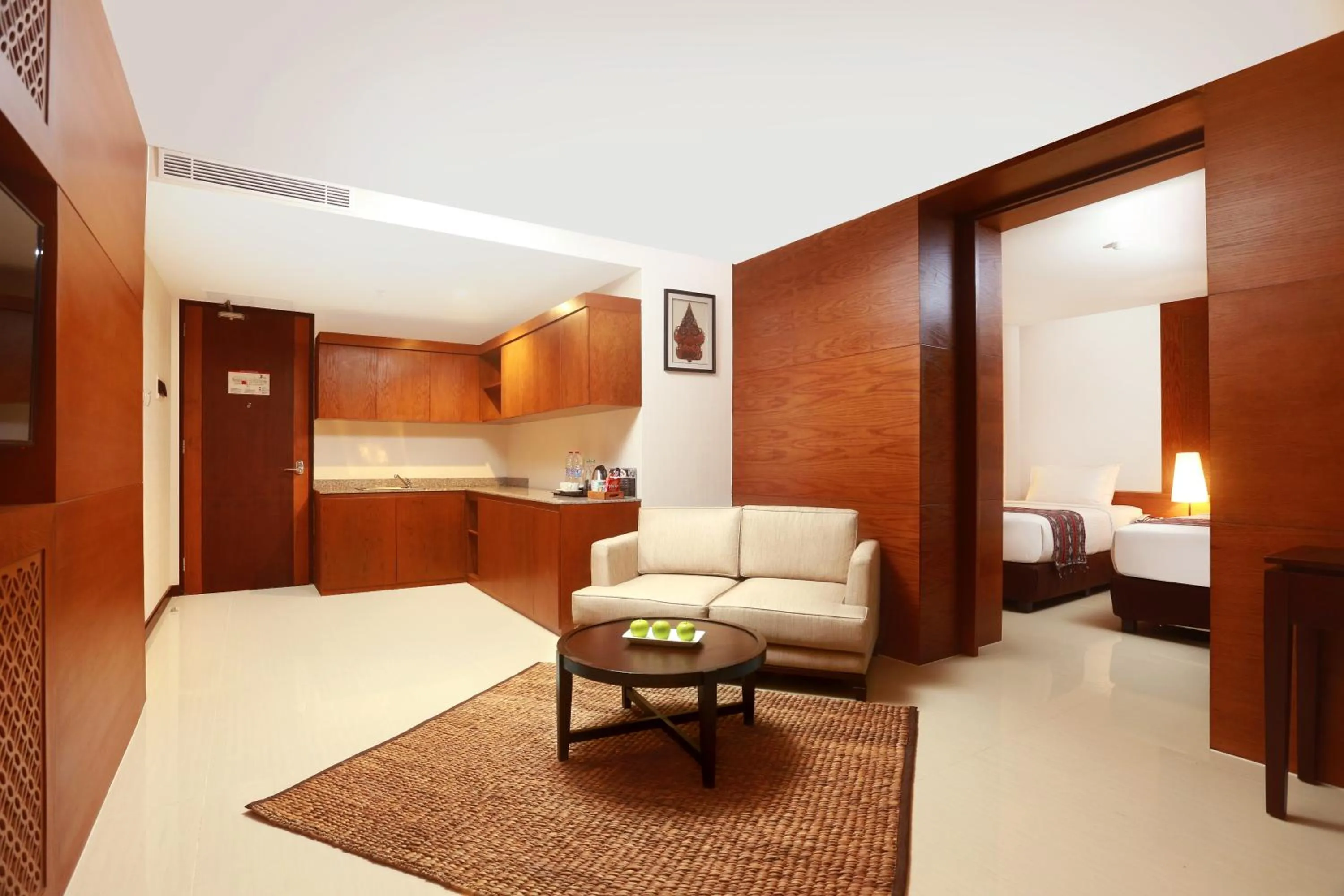 Living room, Bed in Wimarion Hotel Semarang