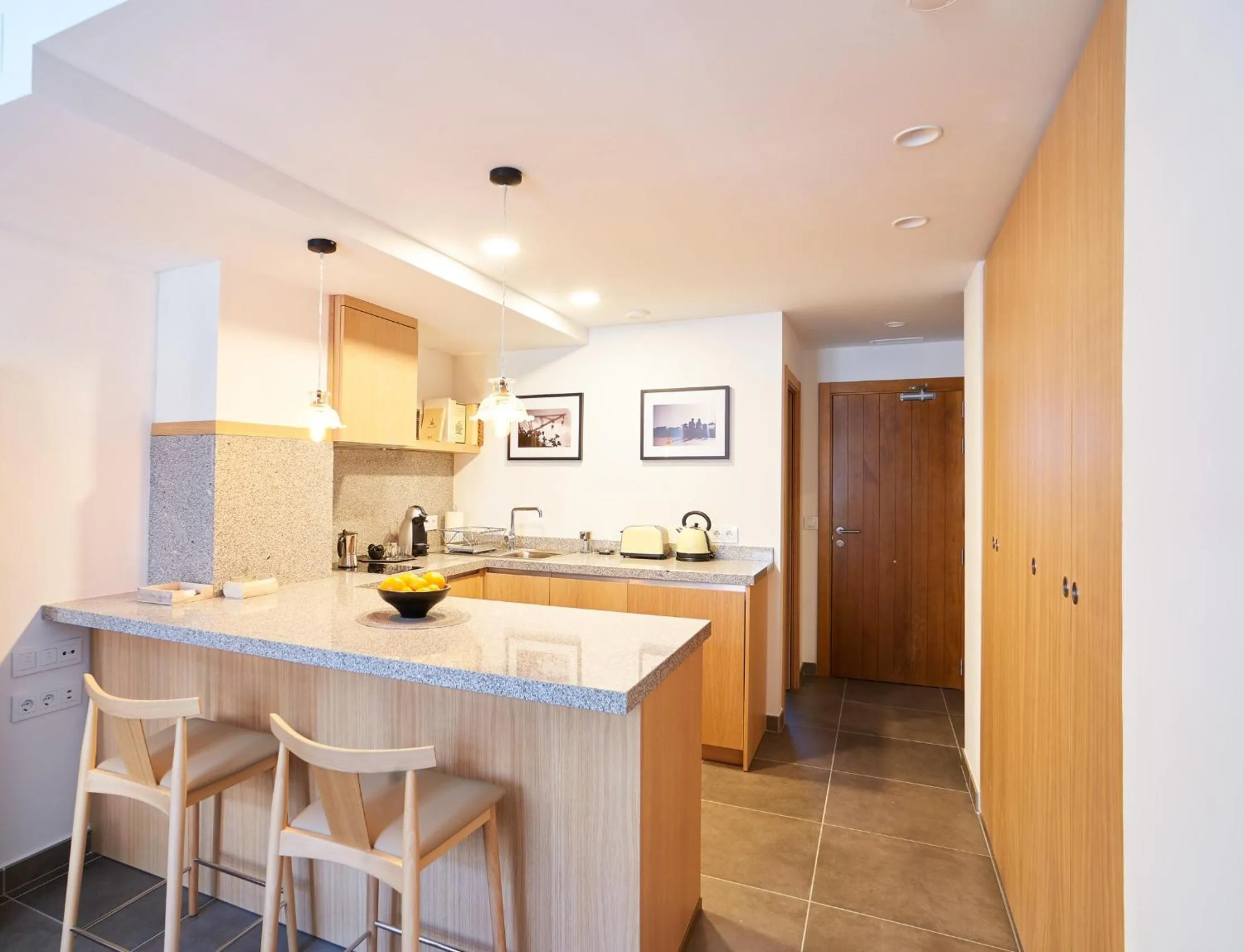 Kitchen or kitchenette in Barracart Apartments