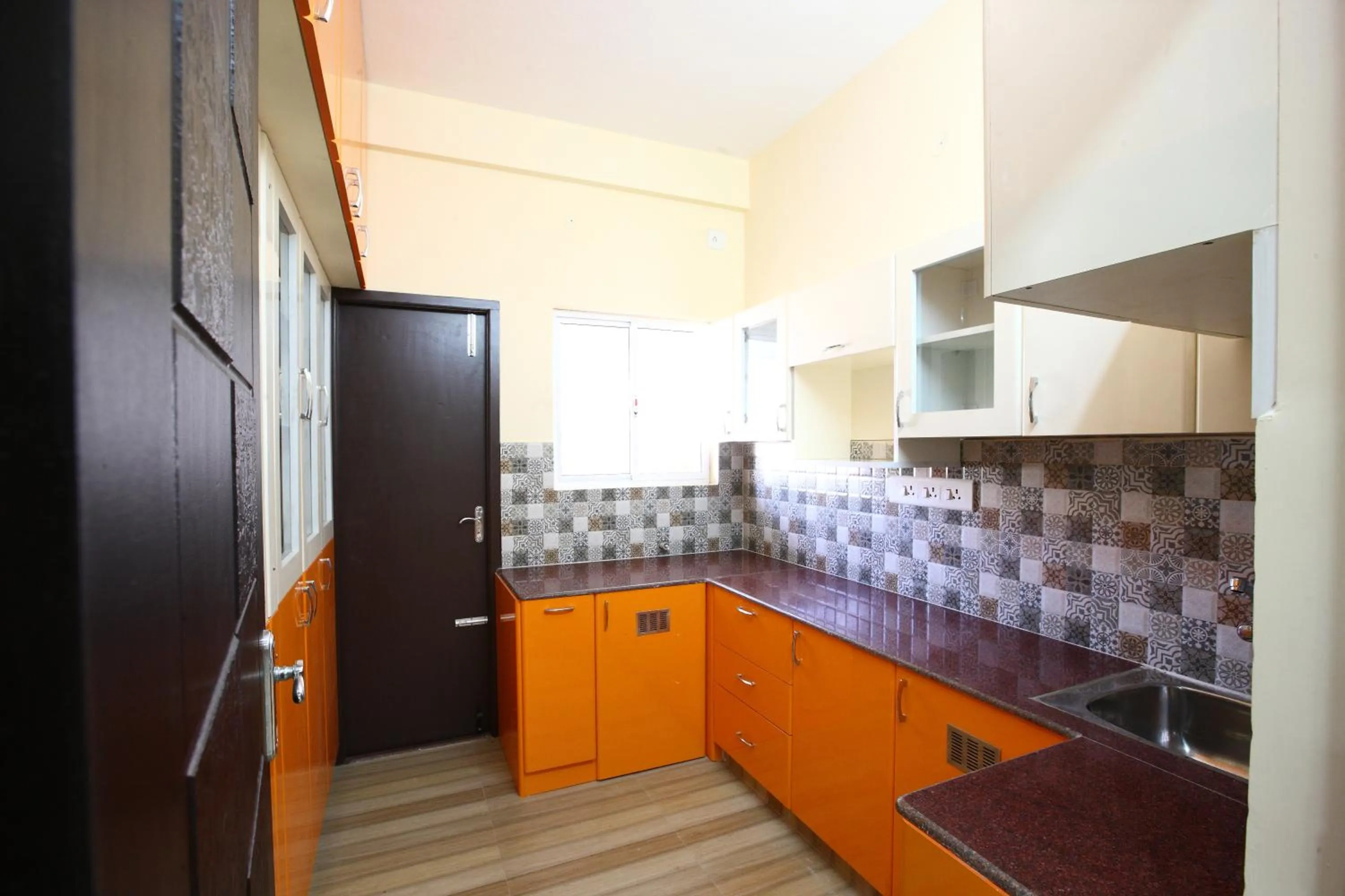 Kitchen or kitchenette in Sreedevi Residency