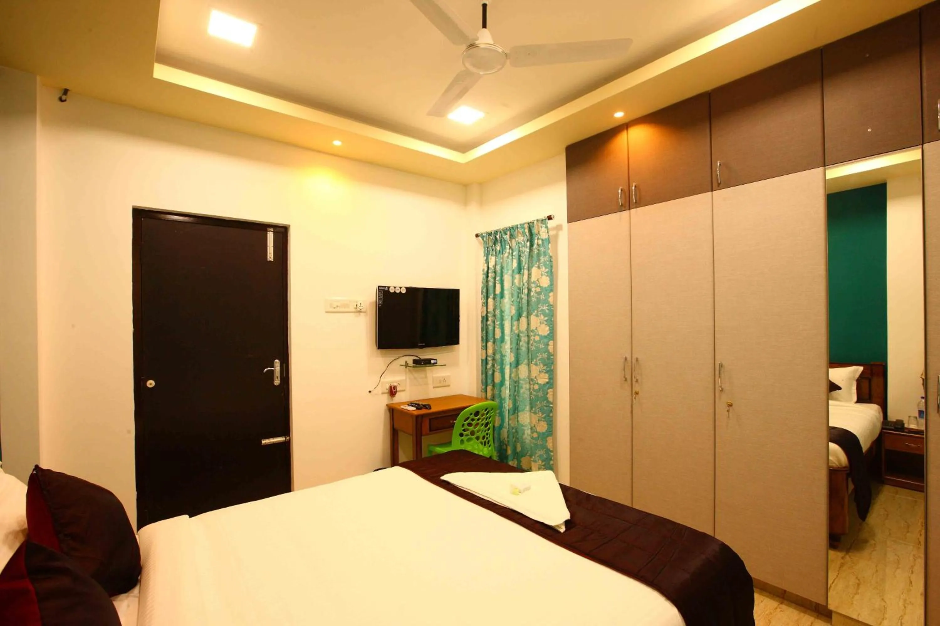 Photo of the whole room, Bed in Sreedevi Residency