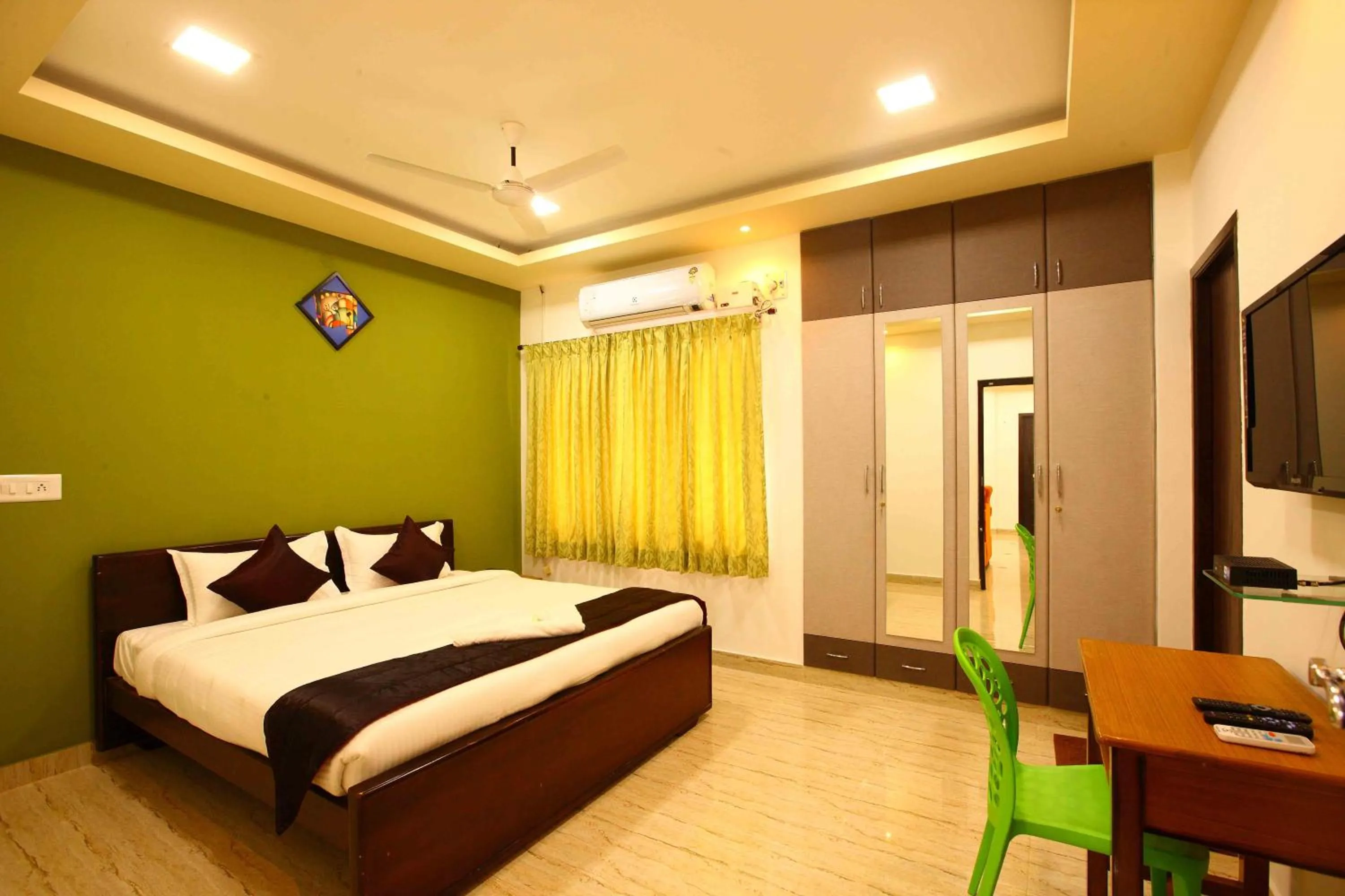 Photo of the whole room, Bed in Sreedevi Residency