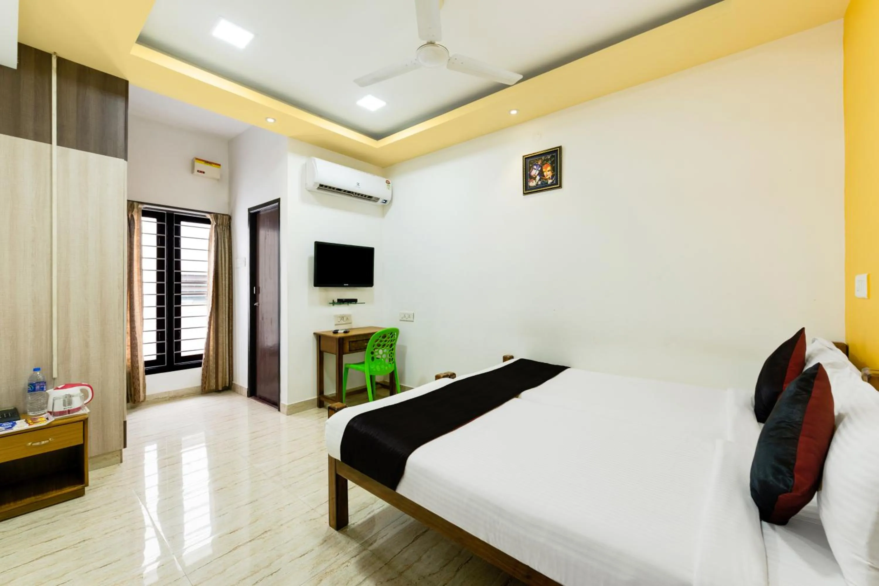 Photo of the whole room, Bed in Sreedevi Residency