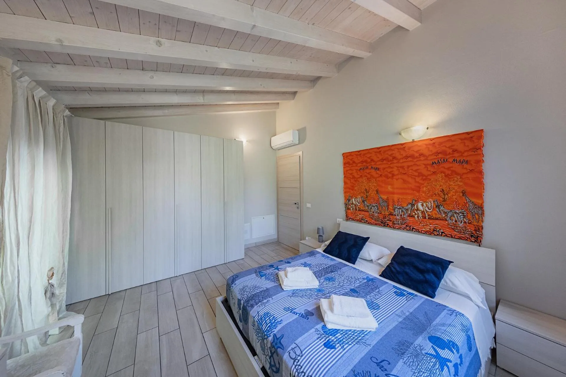 Bed in Mimosa Apartments