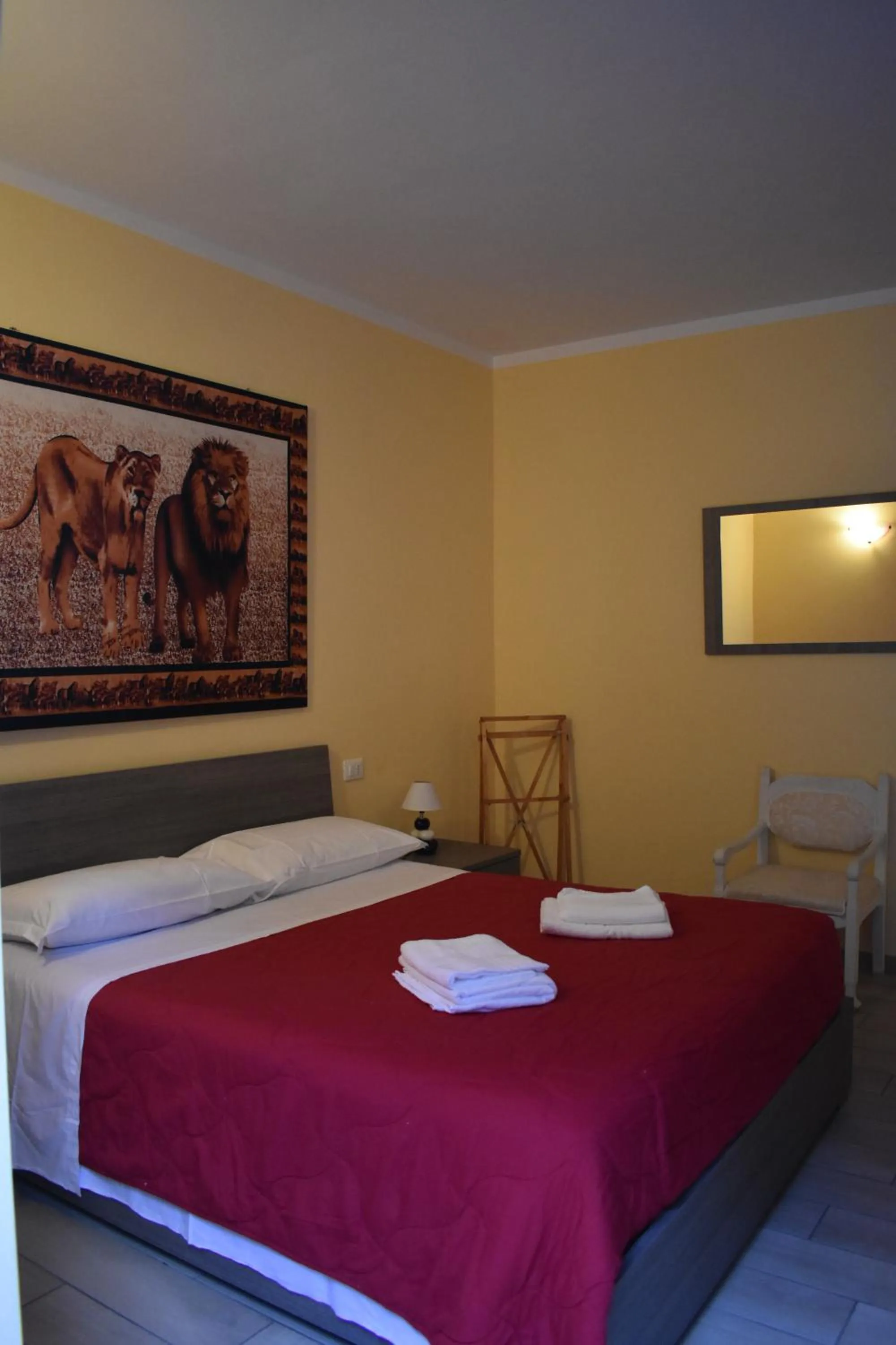 Bedroom, Bed in Mimosa Apartments