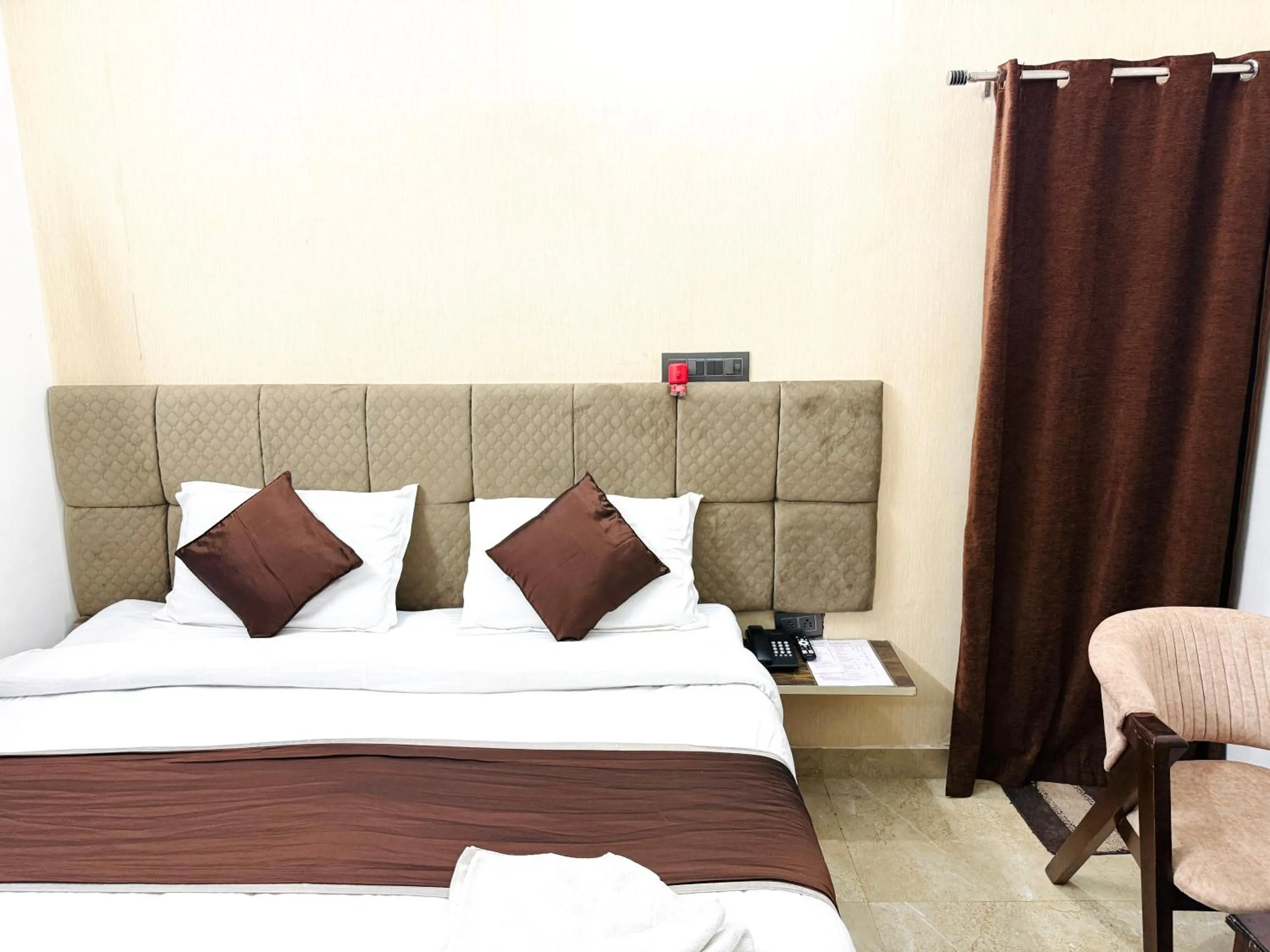 Bed in Krishna Residency - A Boutique Hotel