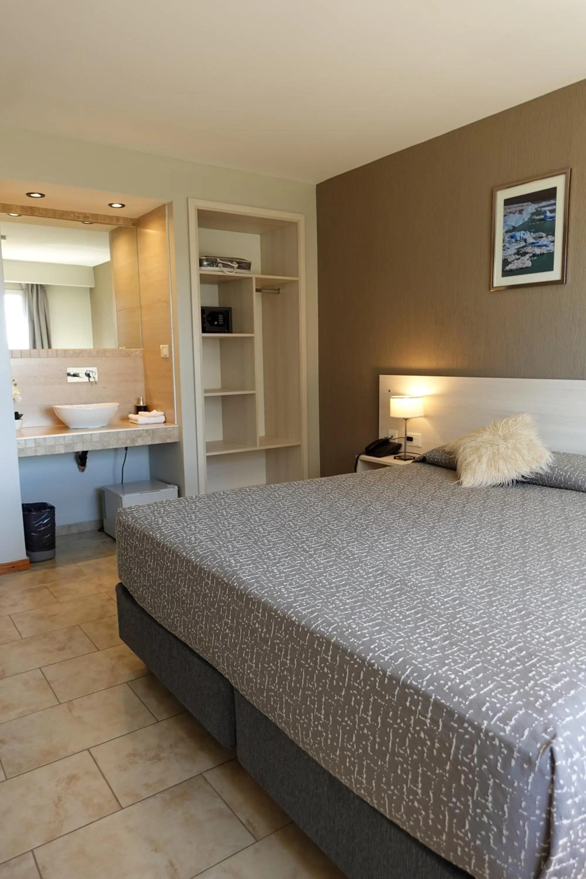 Bedroom, Bed in Tierra Tehuelche Hostería y Aparts