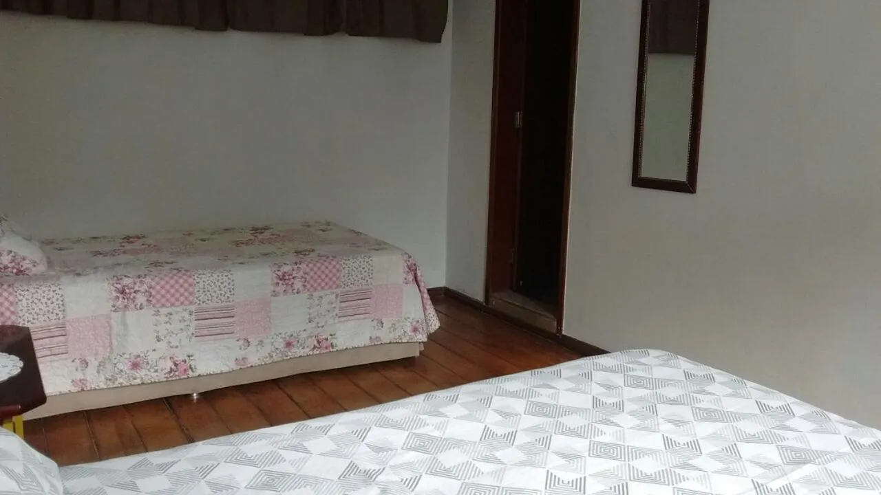 Bed in Pousada Ana Poipa