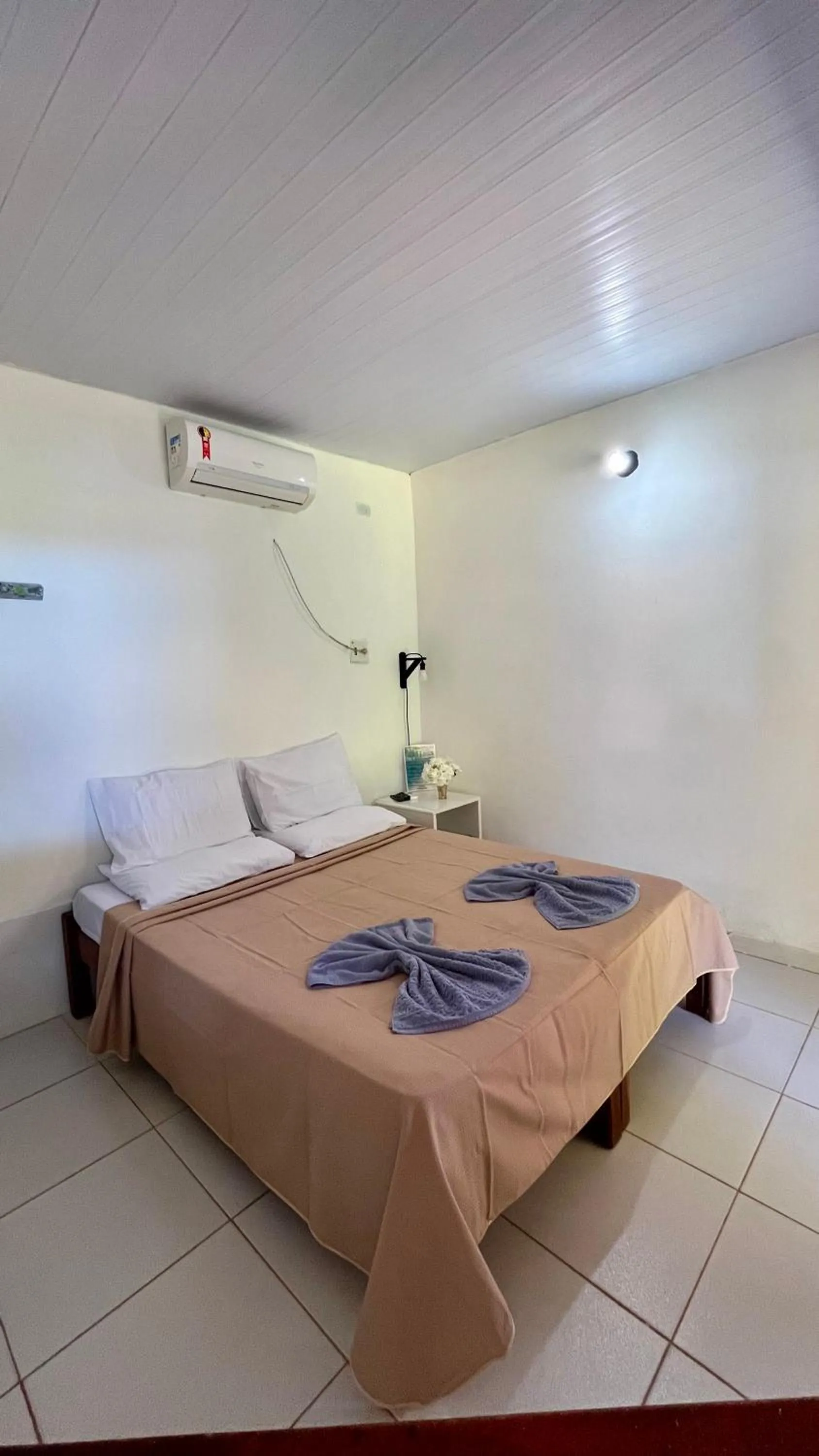 Bed in Pousada Estrela do Mar