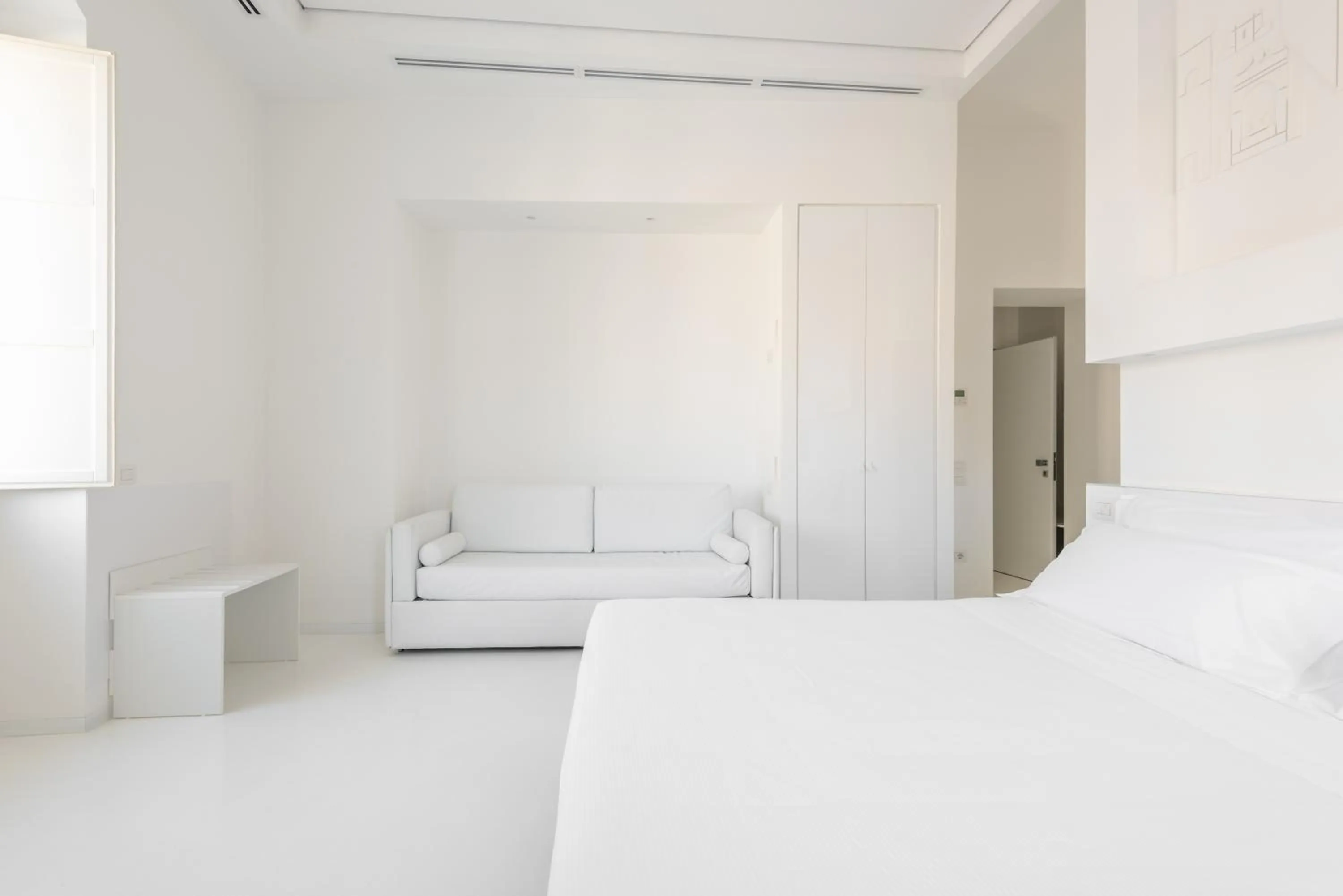 Bed in Vittorio Veneto Matera Luxury Rooms