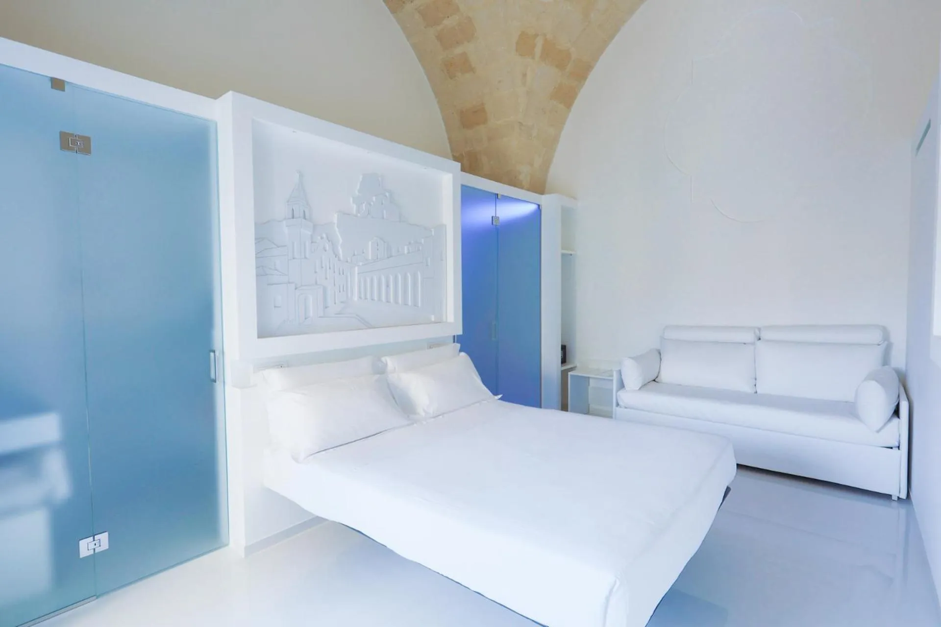 Bed in Vittorio Veneto Matera Luxury Rooms