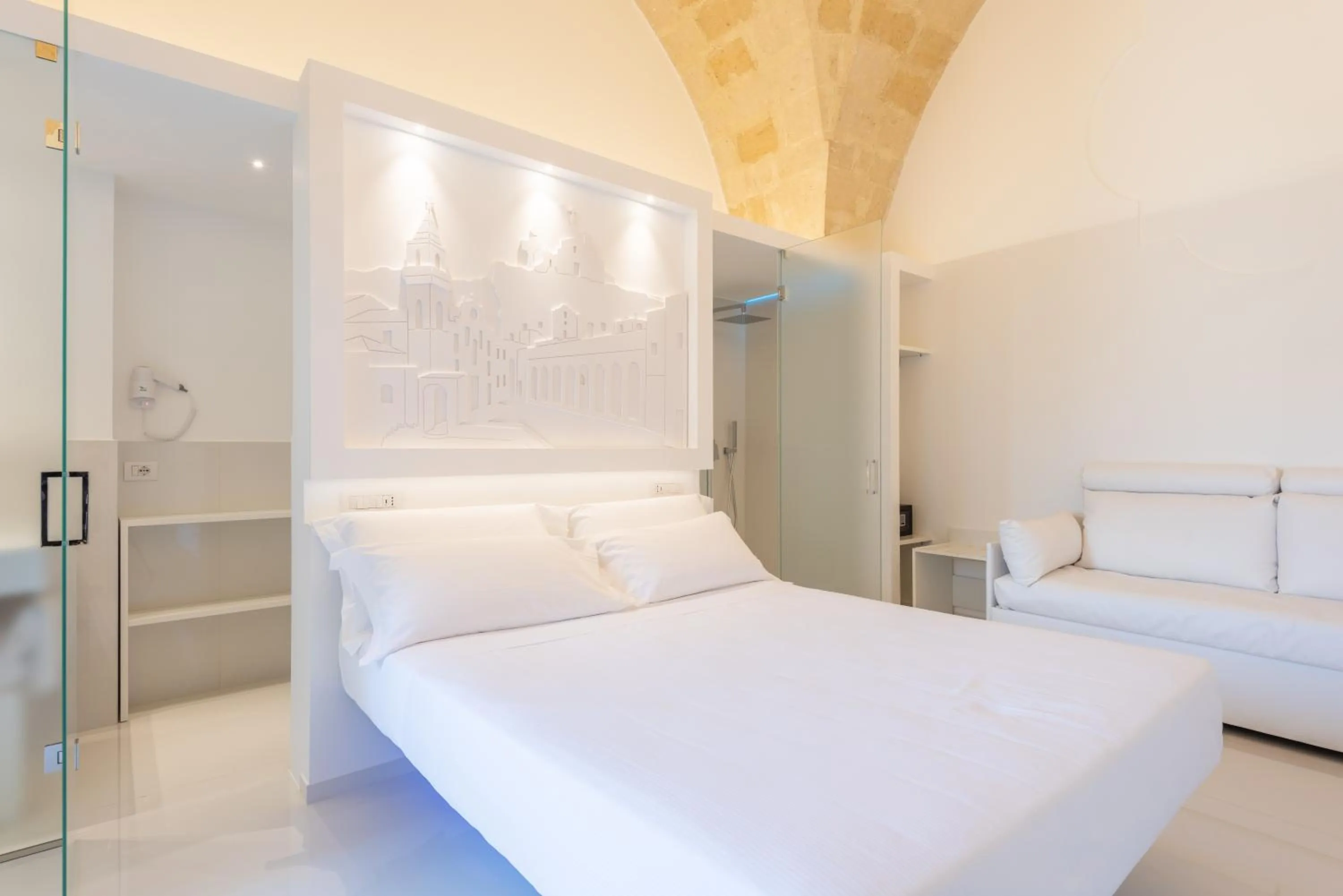 Bed in Vittorio Veneto Matera Luxury Rooms