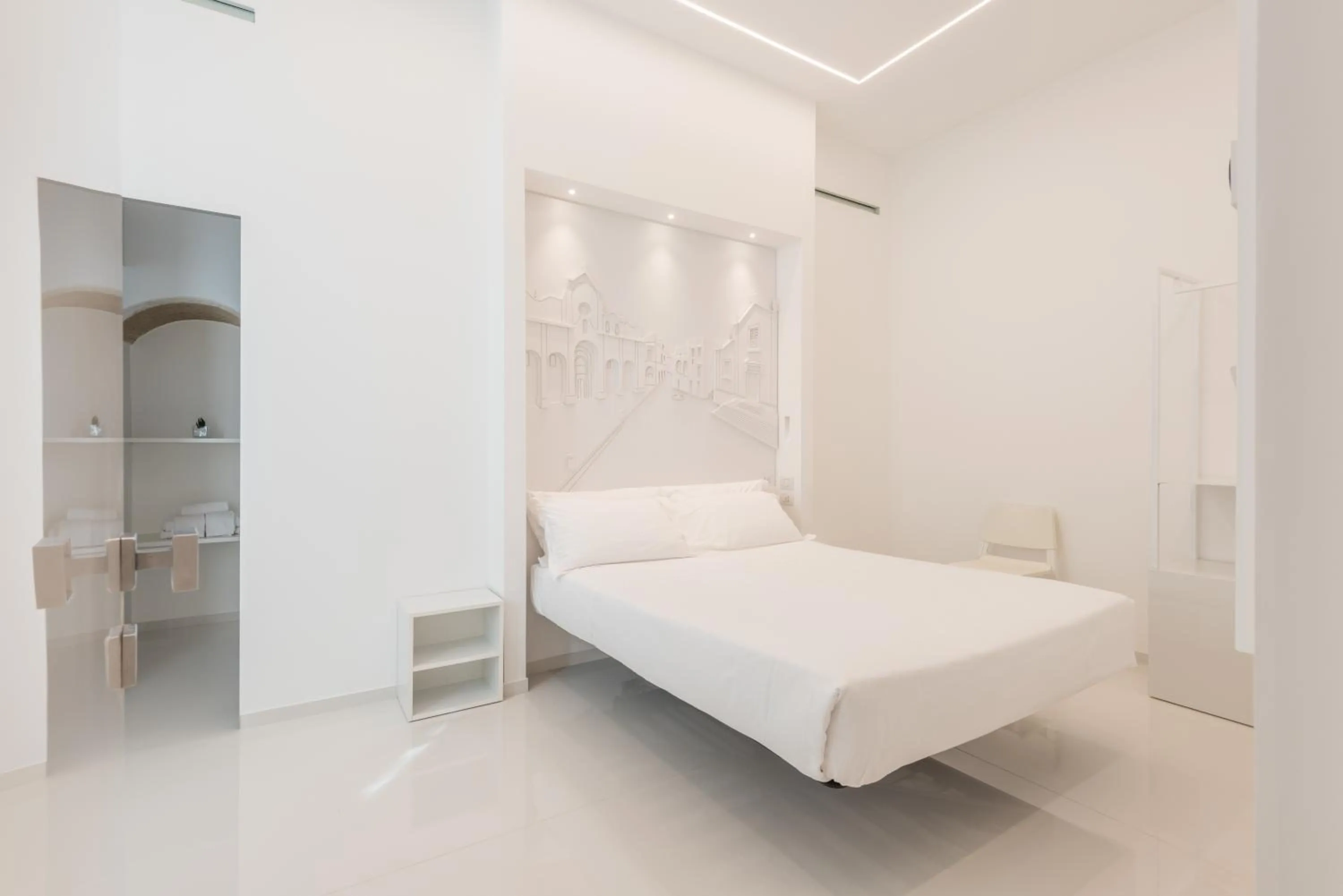 Bed in Vittorio Veneto Matera Luxury Rooms