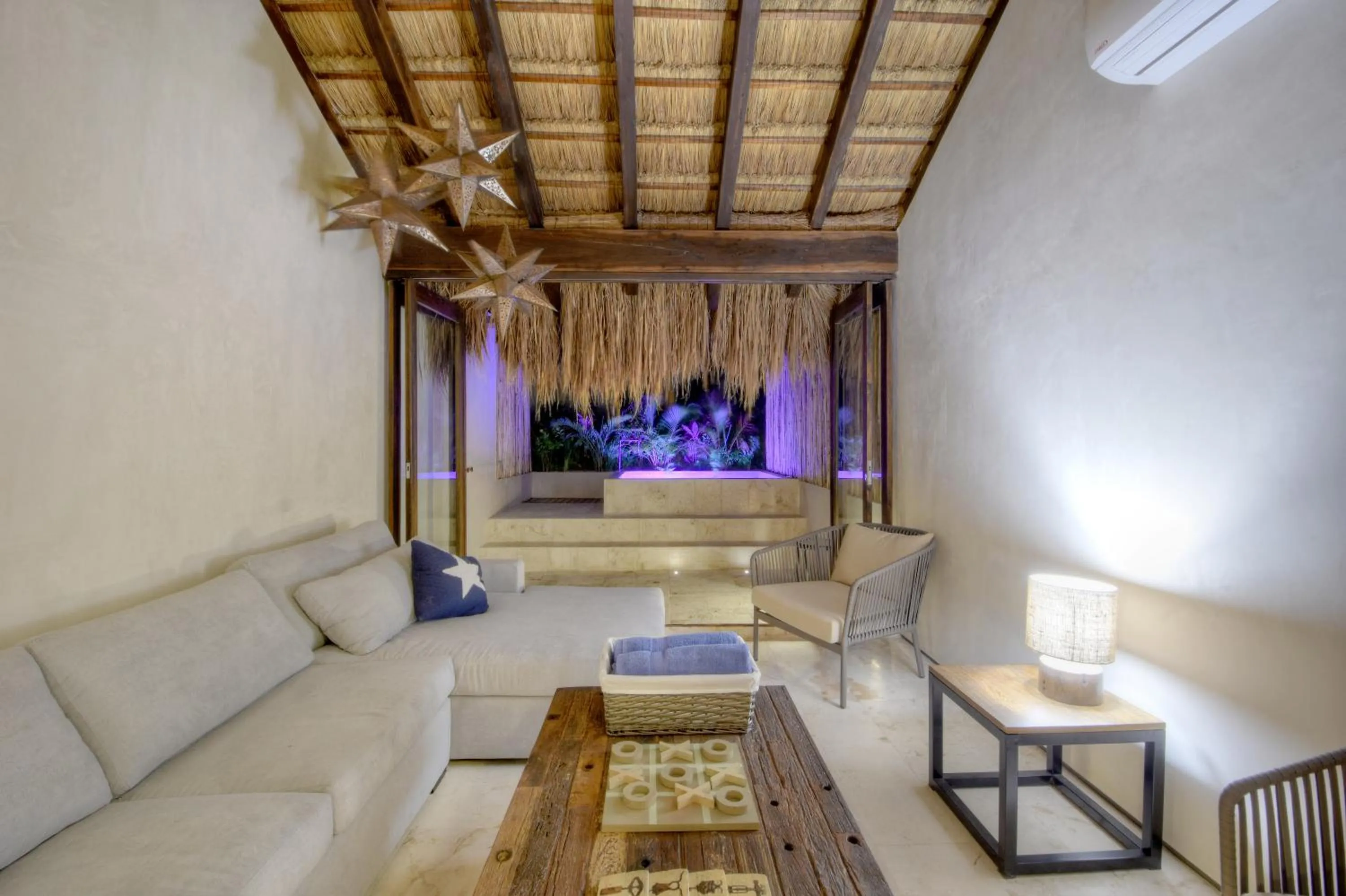 Balcony/Terrace in Eco-chic Design Condos Wrapped in Nature's Elements by Stella Rentals