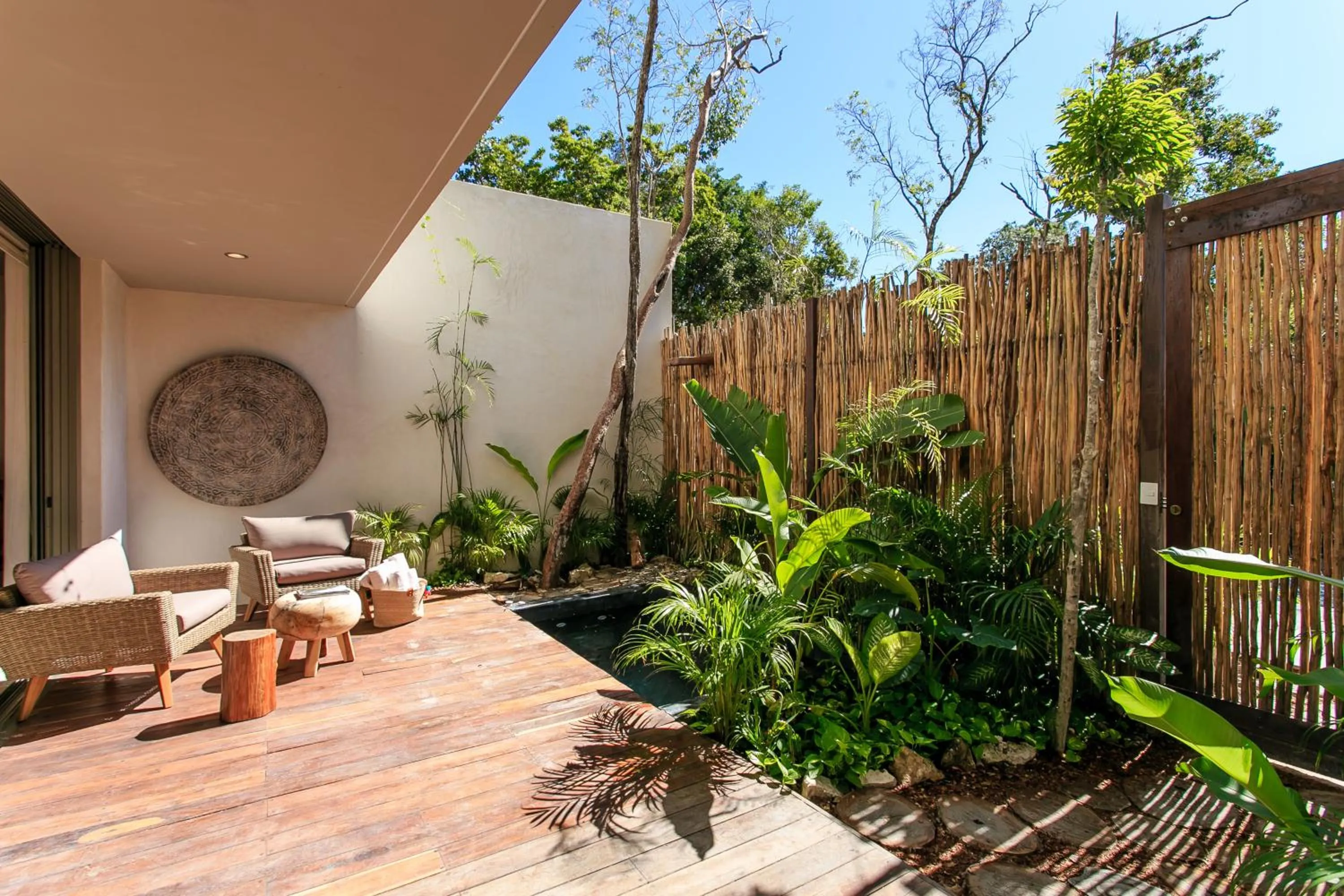 Balcony/Terrace in Eco-chic Design Condos Wrapped in Nature's Elements by Stella Rentals