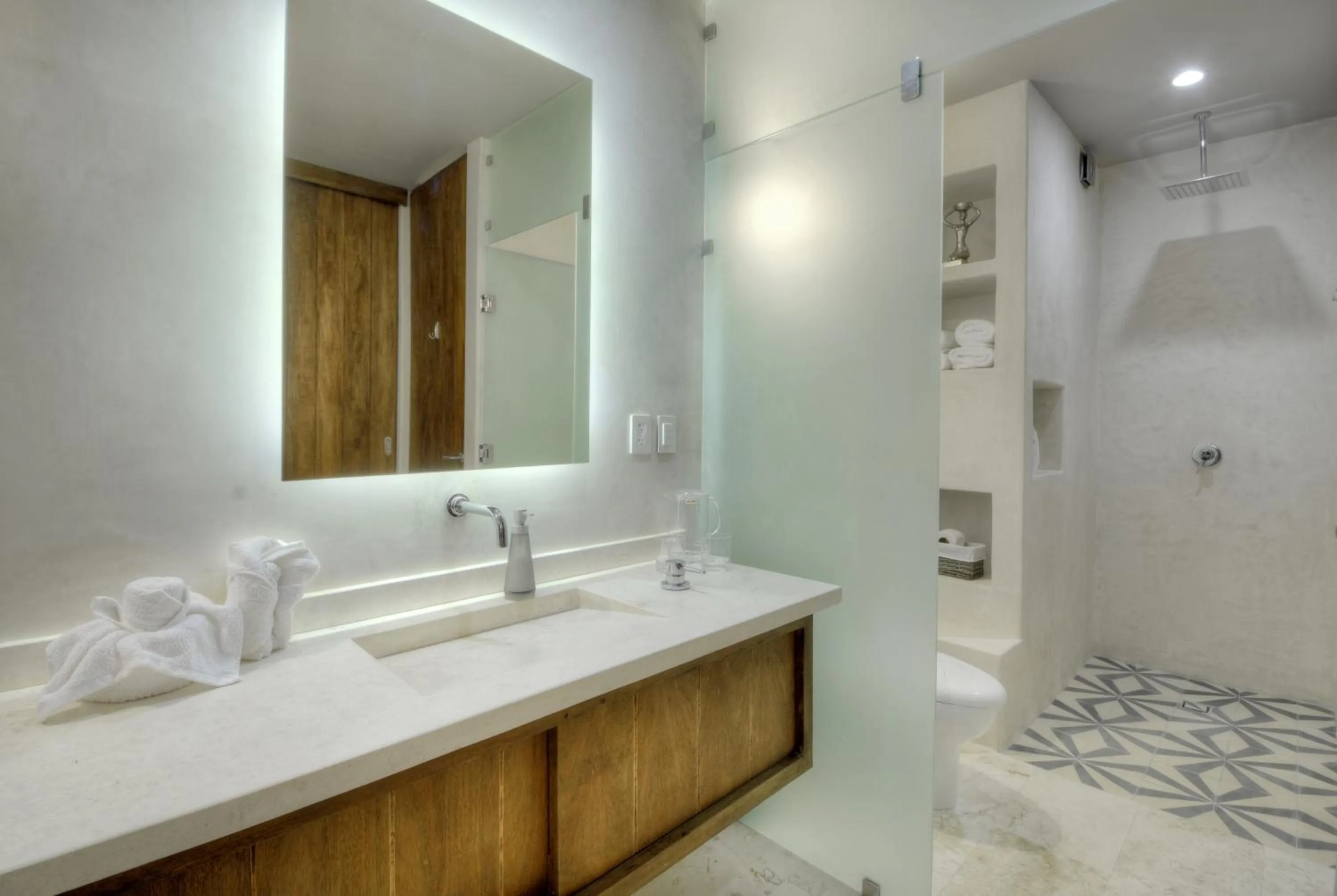 Bathroom in Eco-chic Design Condos Wrapped in Nature's Elements by Stella Rentals