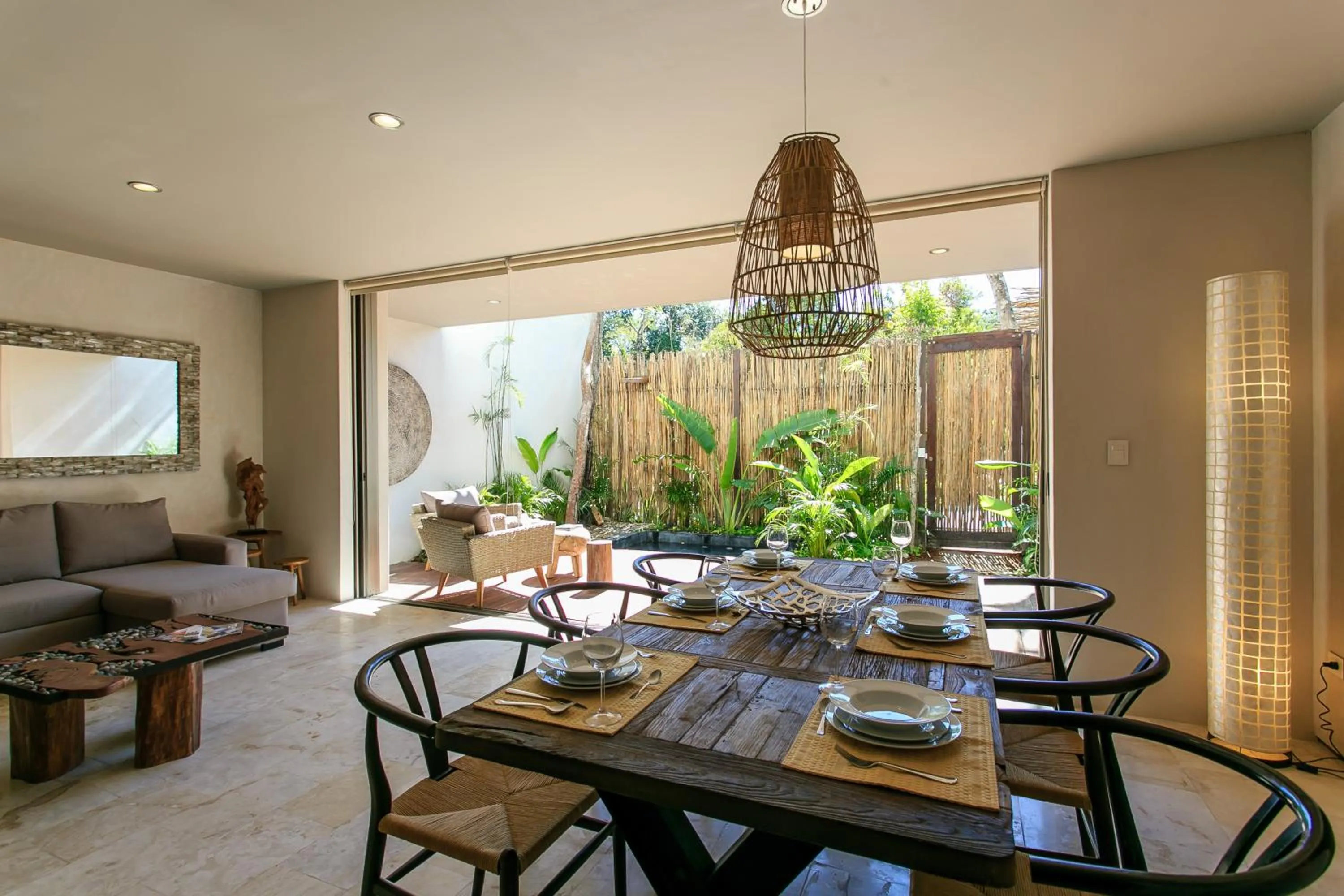 Balcony/Terrace in Eco-chic Design Condos Wrapped in Nature's Elements by Stella Rentals